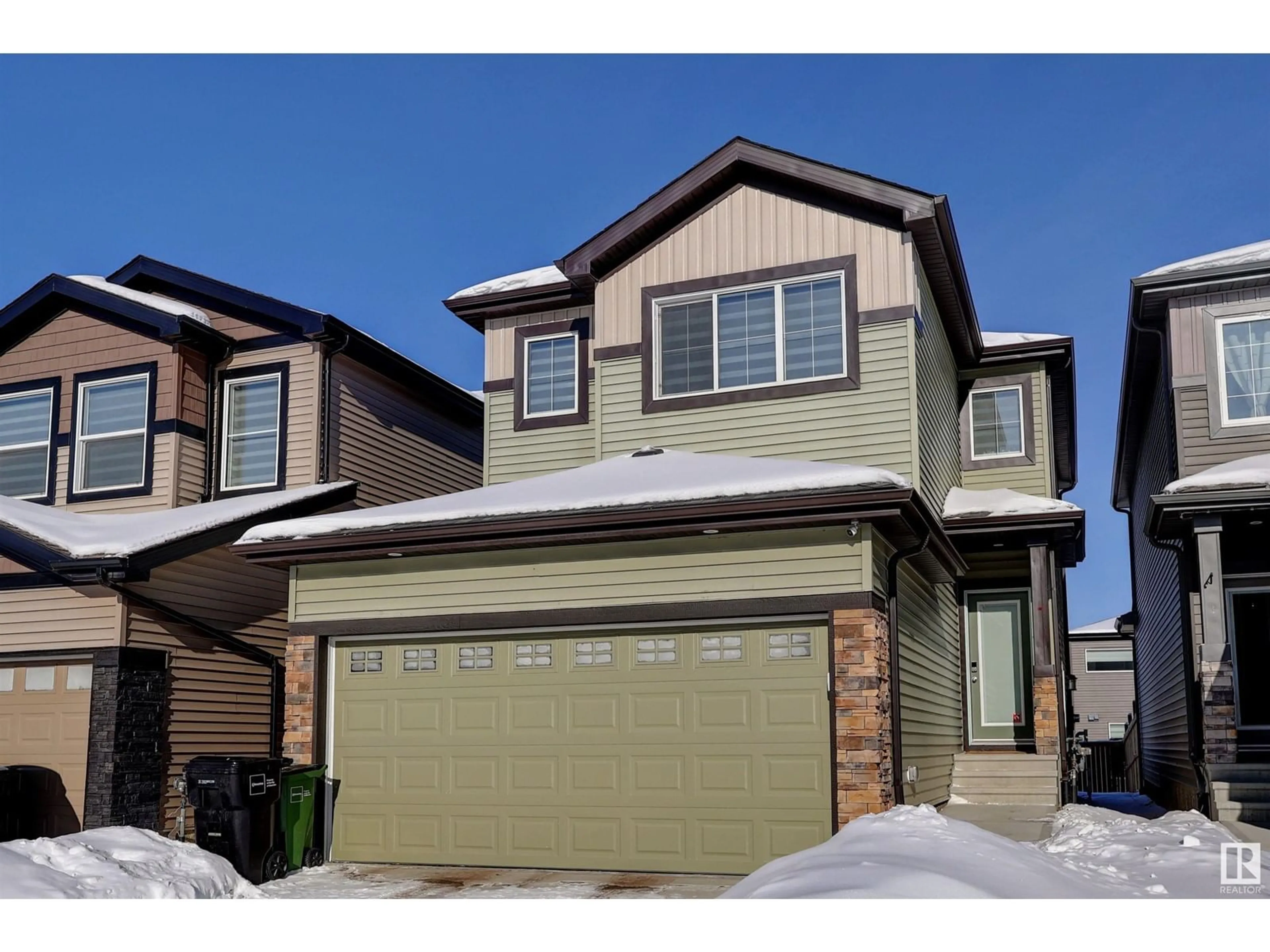 Home with vinyl exterior material, street for 9448 PEAR CR SW SW, Edmonton Alberta T6X2Z5