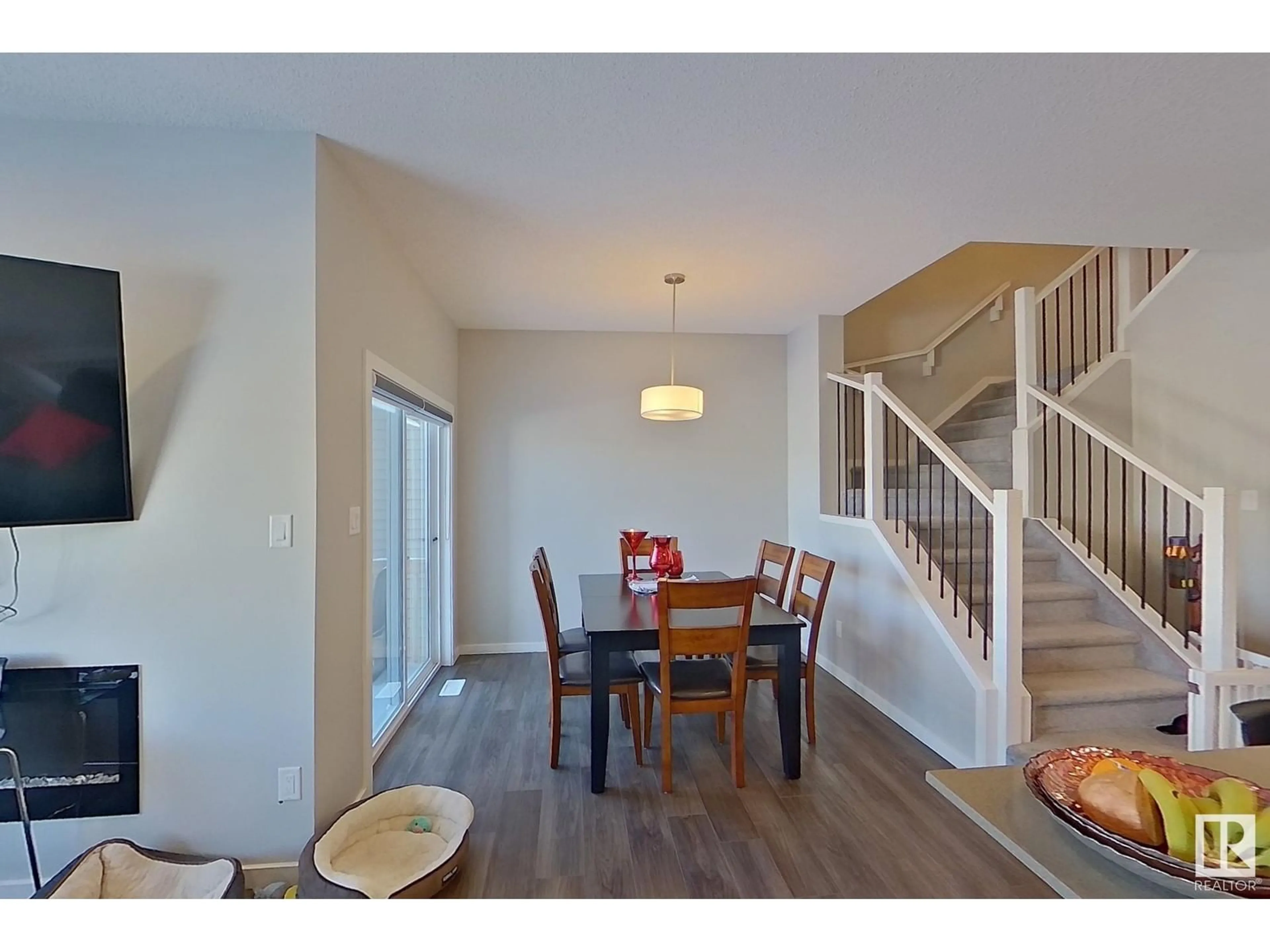 Dining room, wood/laminate floor for 9448 PEAR CR SW SW, Edmonton Alberta T6X2Z5