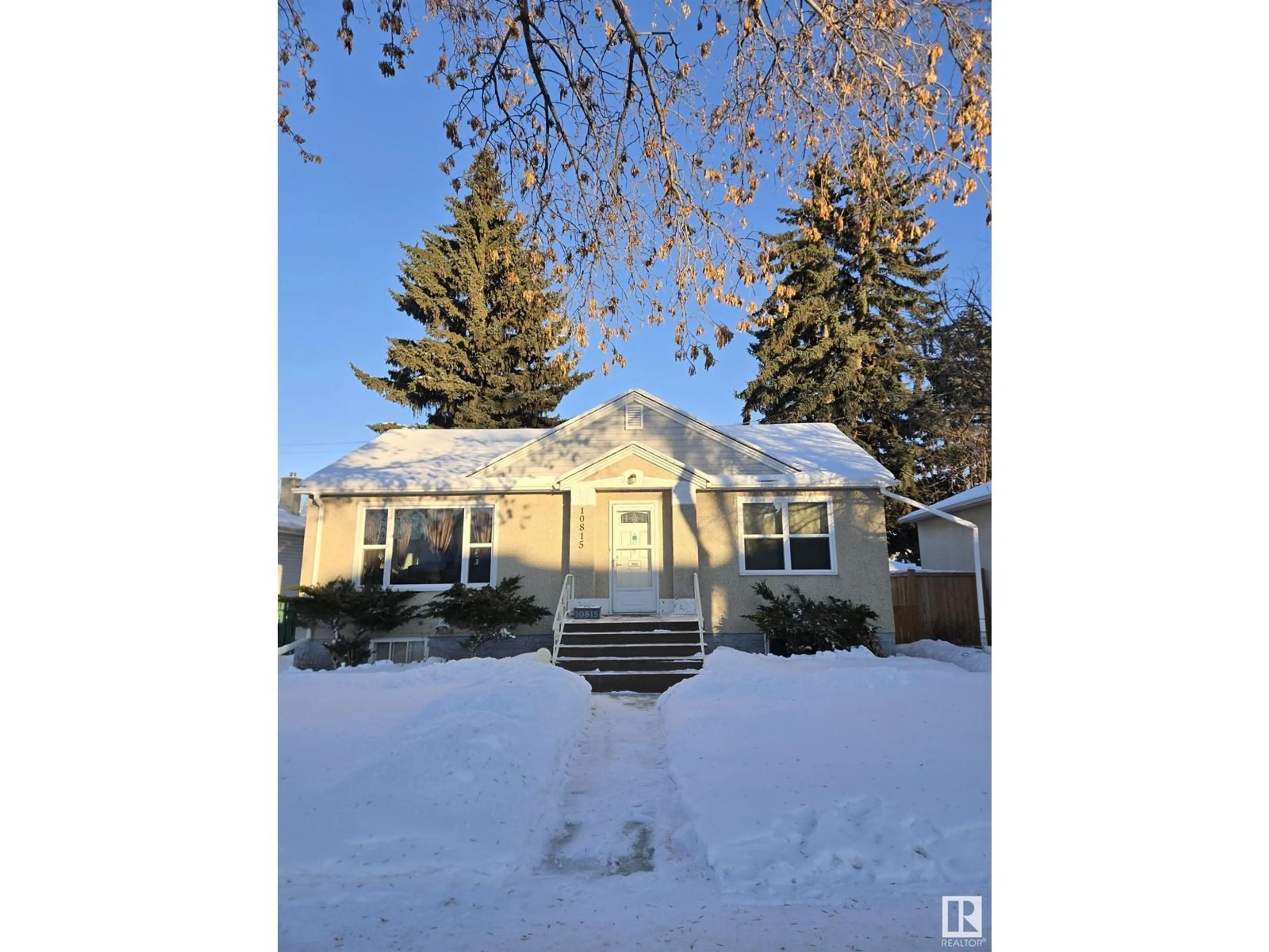 A pic from outside/outdoor area/front of a property/back of a property/a pic from drone, street for 10815 135 ST NW NW, Edmonton Alberta T5M1J8