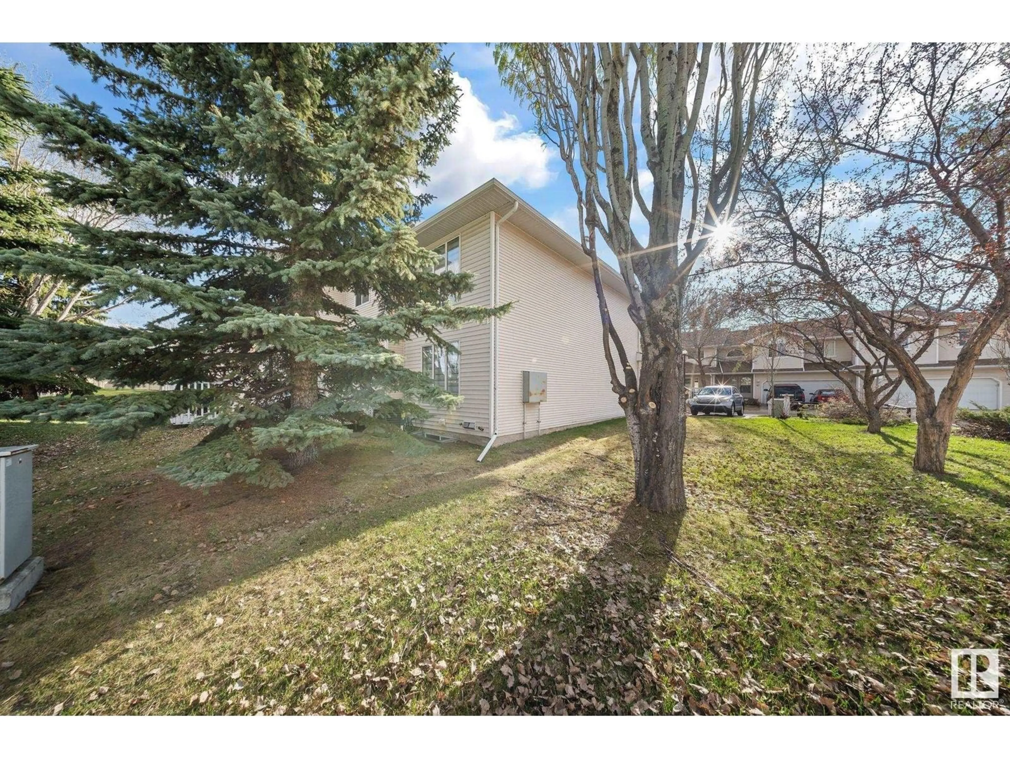 A pic from outside/outdoor area/front of a property/back of a property/a pic from drone, street for 5 - 6608 158 AV, Edmonton Alberta T5Z3H1