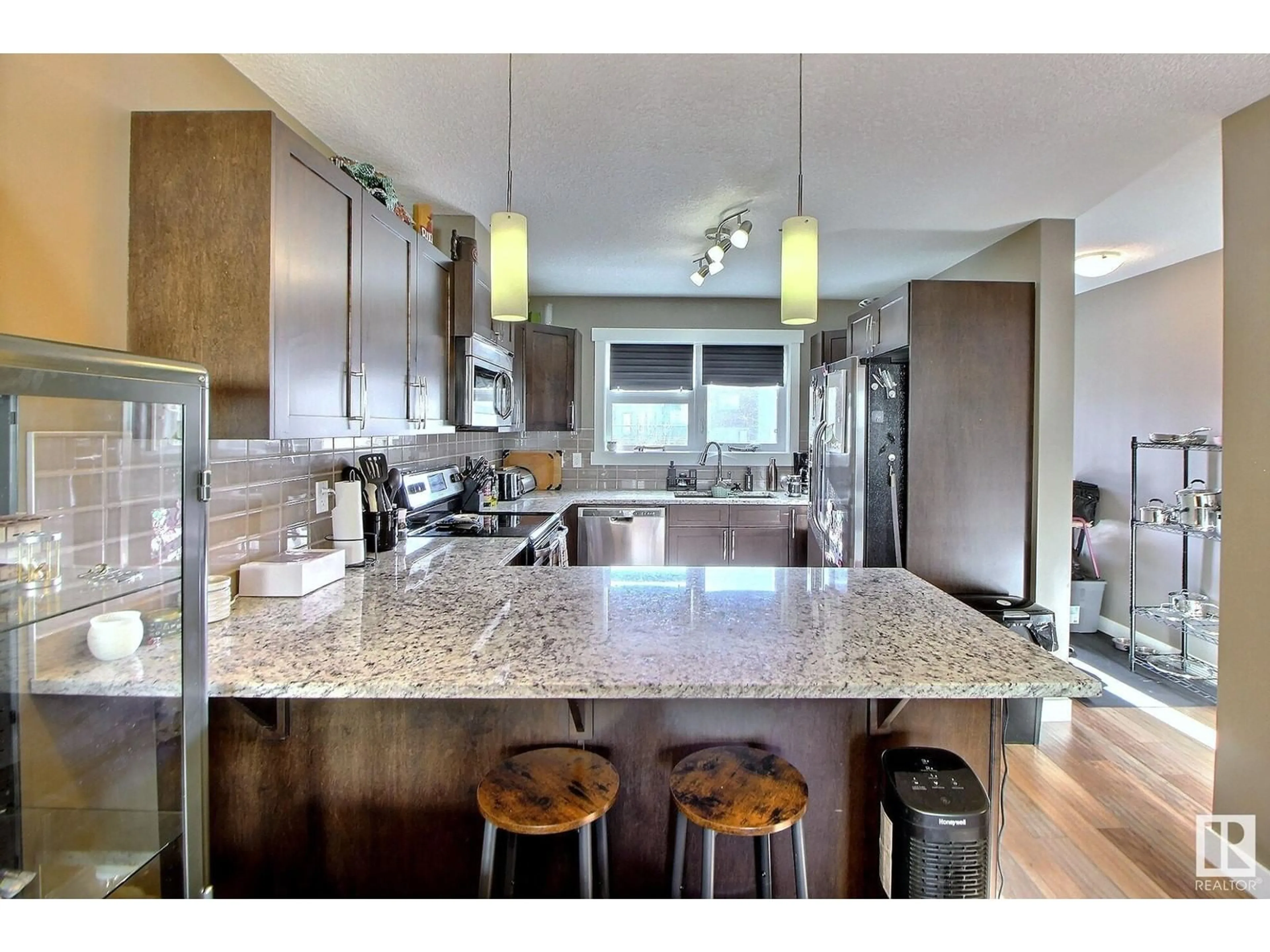 Open concept kitchen, unknown for #211 401 Southfork DR, Leduc Alberta T9E0X1