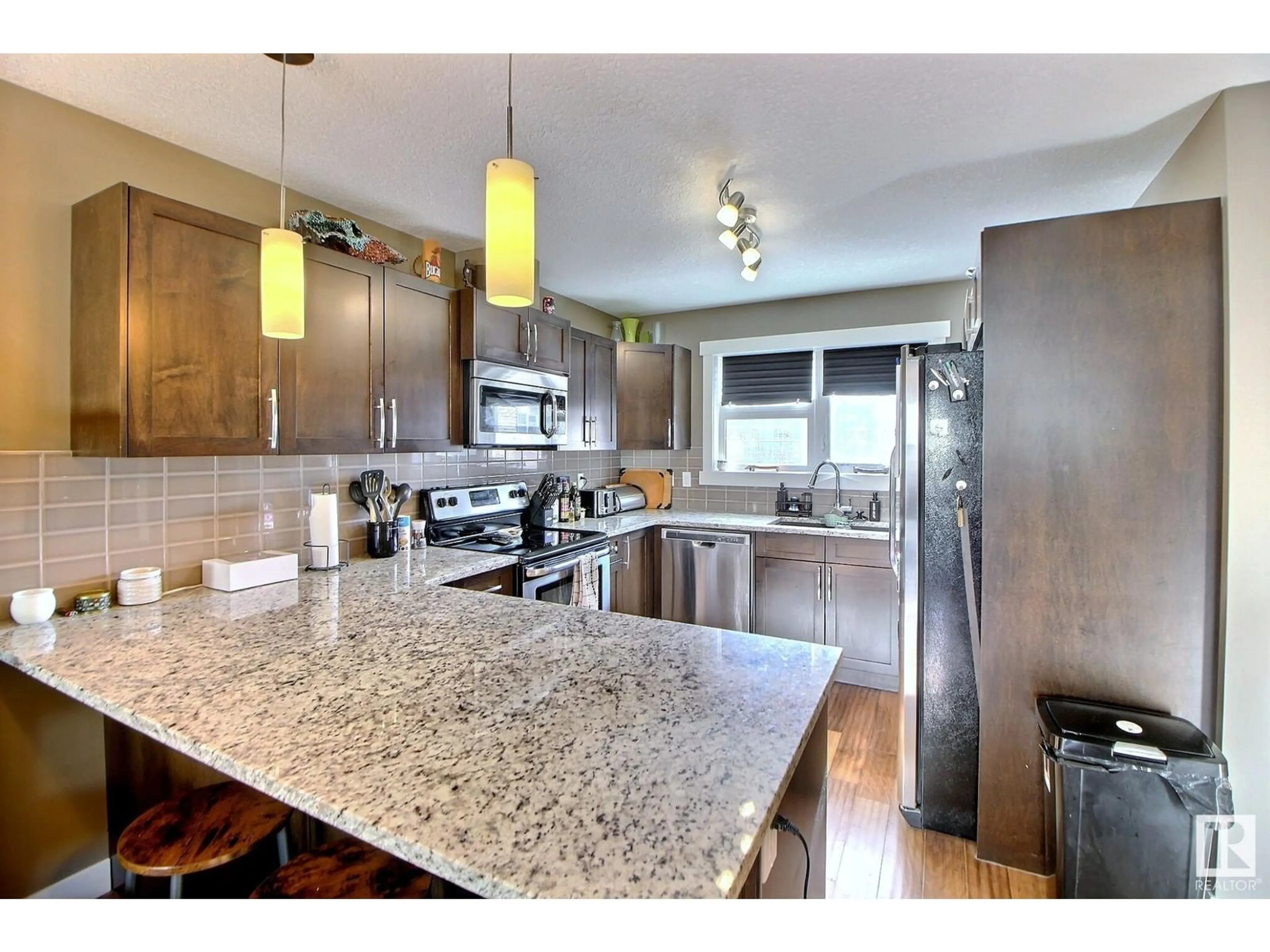 Open concept kitchen, unknown for #211 401 Southfork DR, Leduc Alberta T9E0X1