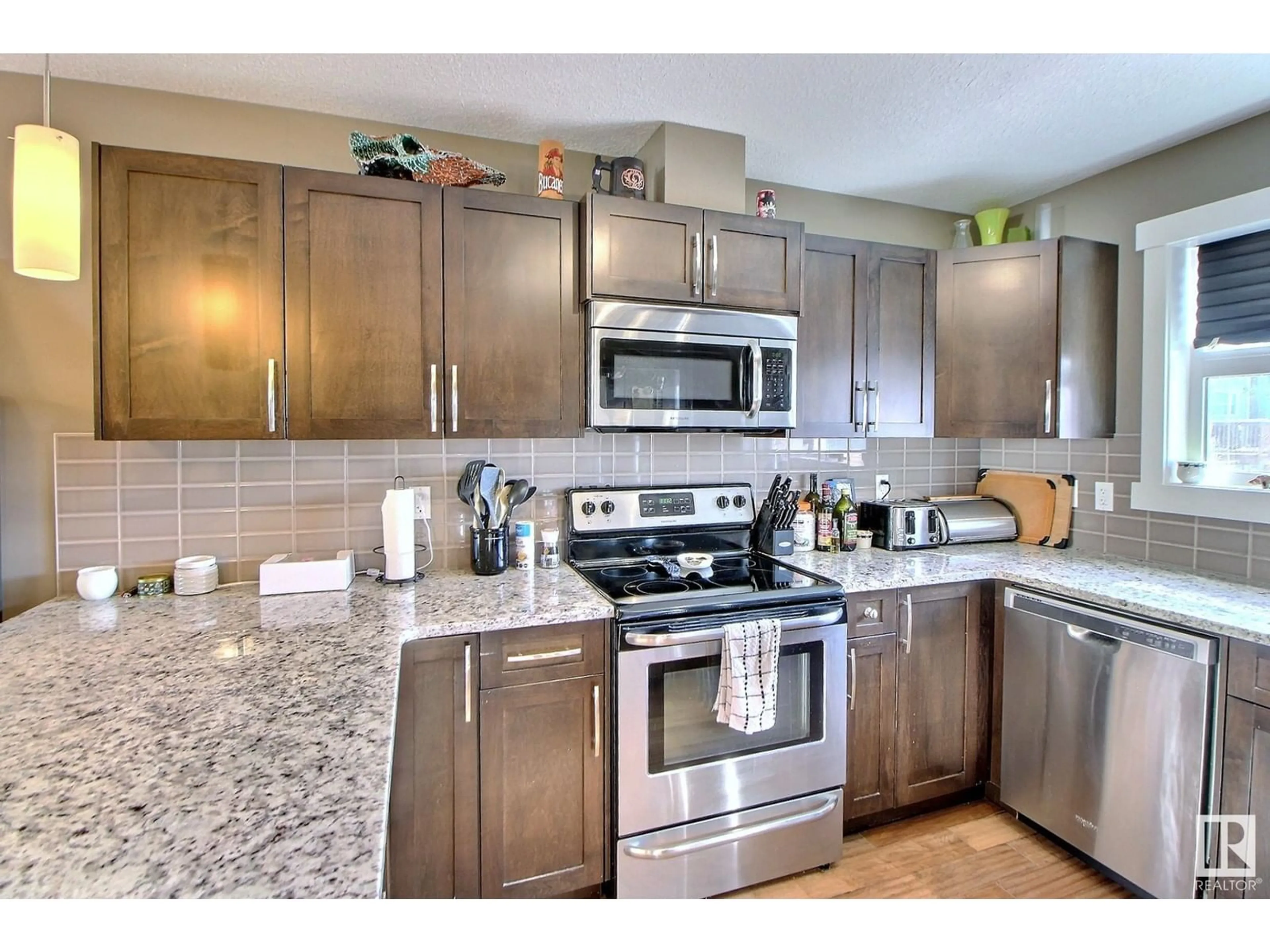 Open concept kitchen, unknown for #211 401 Southfork DR, Leduc Alberta T9E0X1