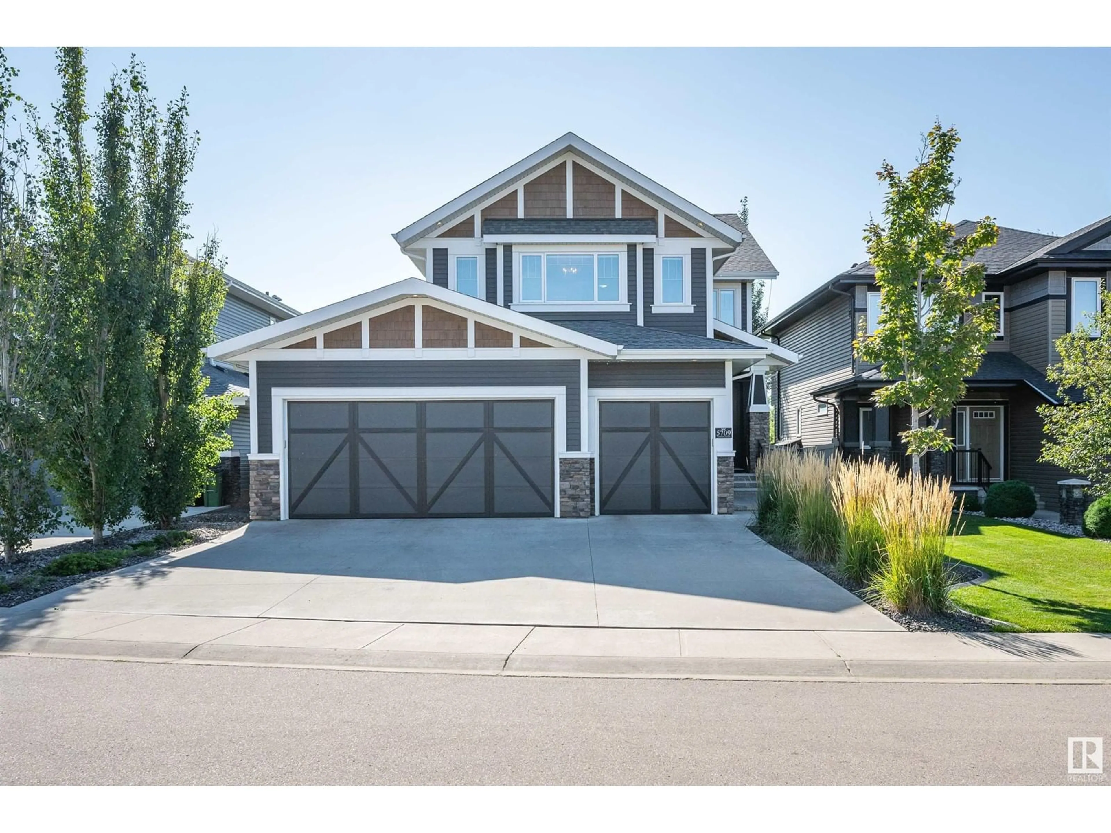 Home with vinyl exterior material, street for 5709 EDWORTHY LANDING LD NW, Edmonton Alberta T6M0P2