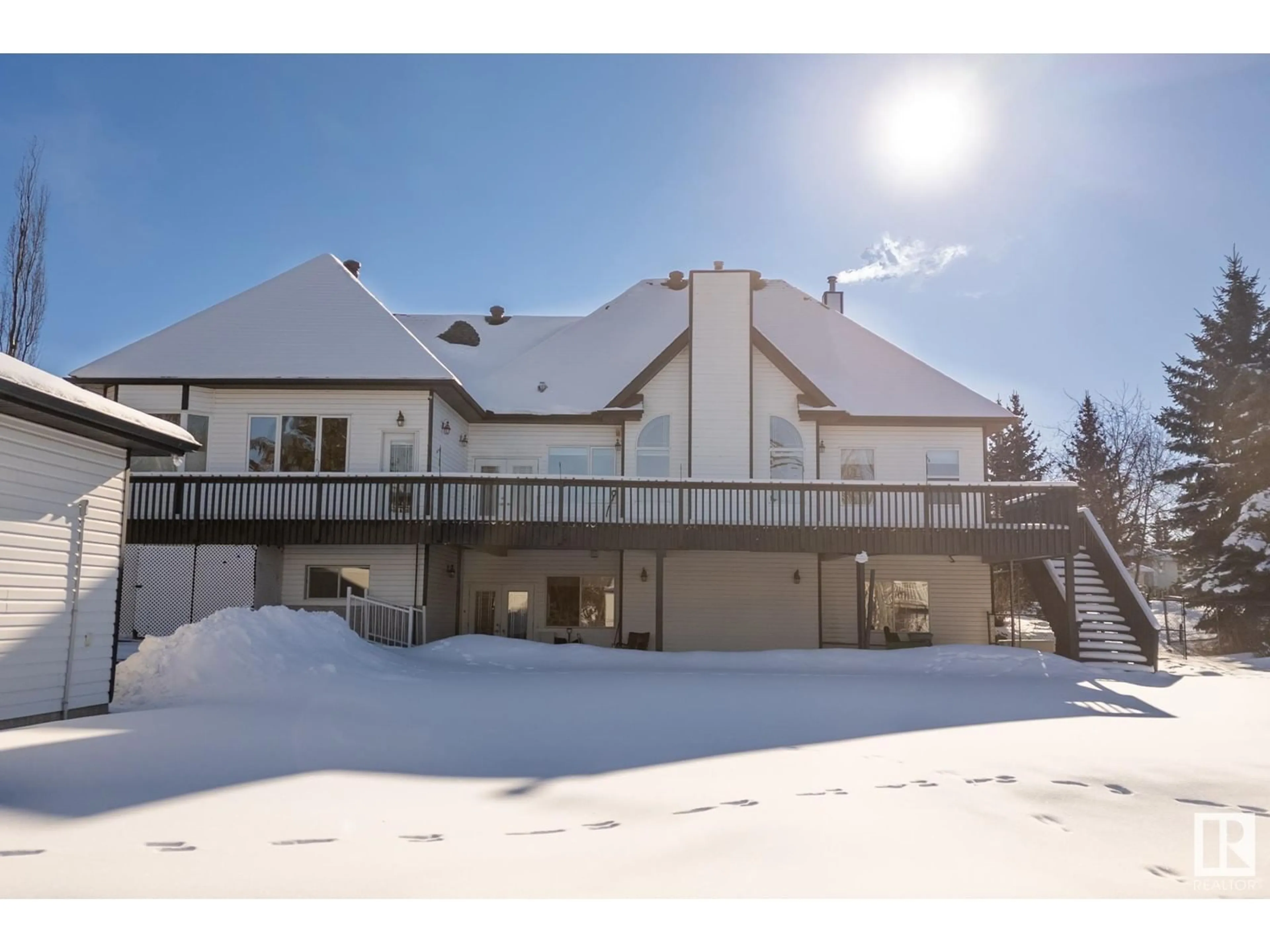 A pic from outside/outdoor area/front of a property/back of a property/a pic from drone, mountain view for #44 26106 TWP ROAD 532 A, Rural Parkland County Alberta T7Y1A3