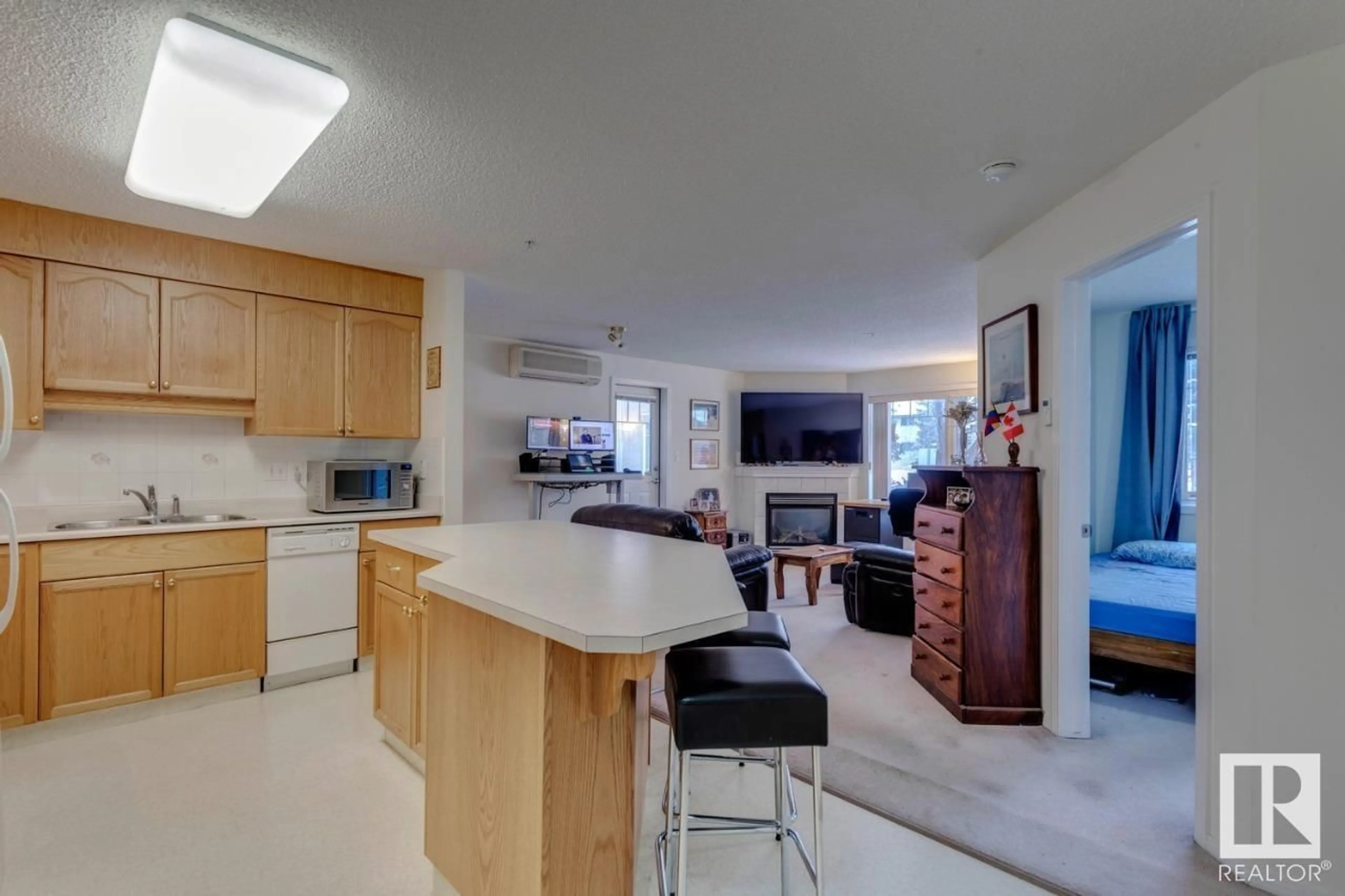 Open concept kitchen, unknown for #119 2420 108 ST NW, Edmonton Alberta T6J7J3