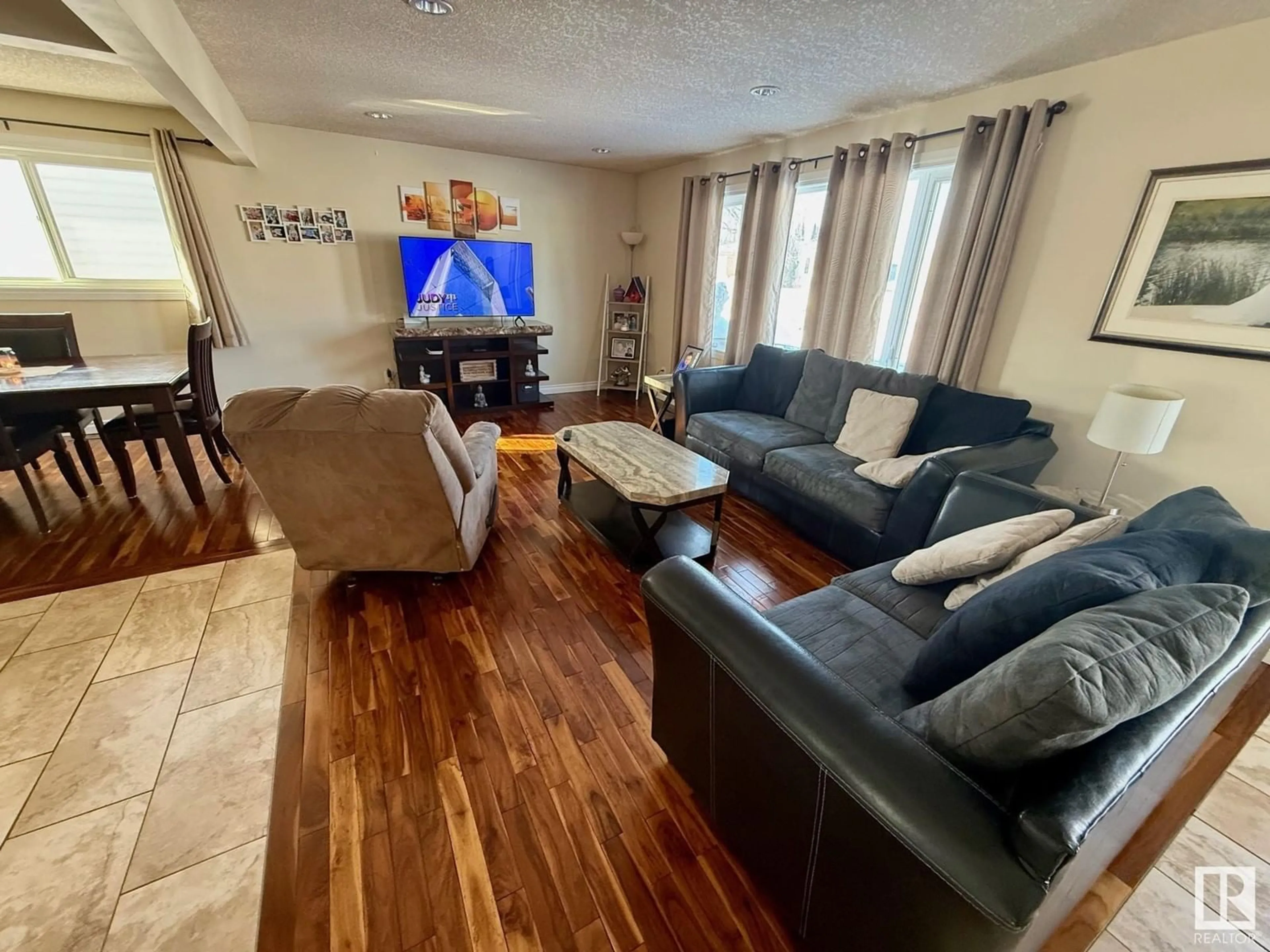 Living room with furniture, unknown for 7207 140 AV NW, Edmonton Alberta T5C2M6