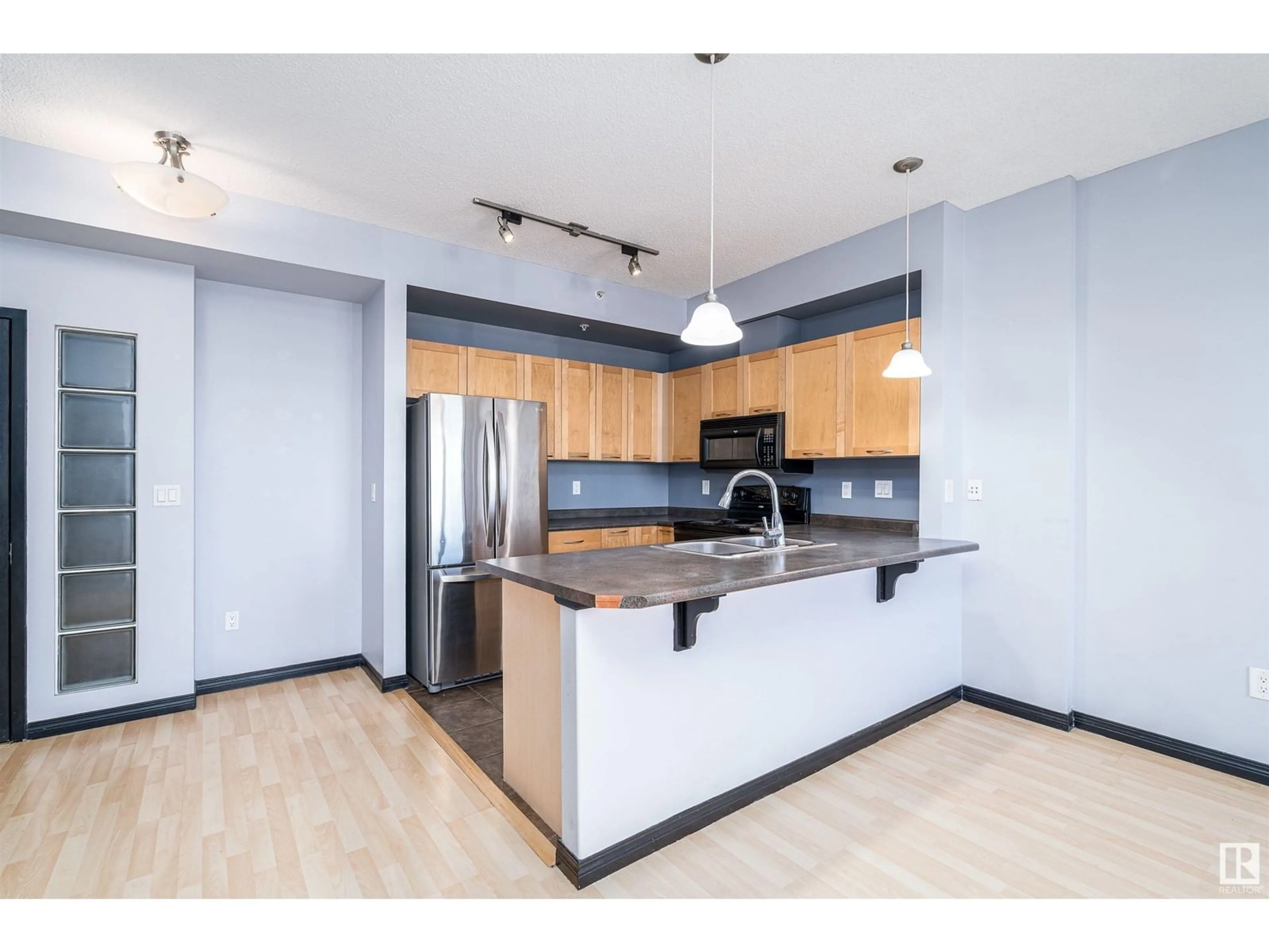 Open concept kitchen, unknown for #1-307 - 4245 139 AV, Edmonton Alberta T5Y3E8