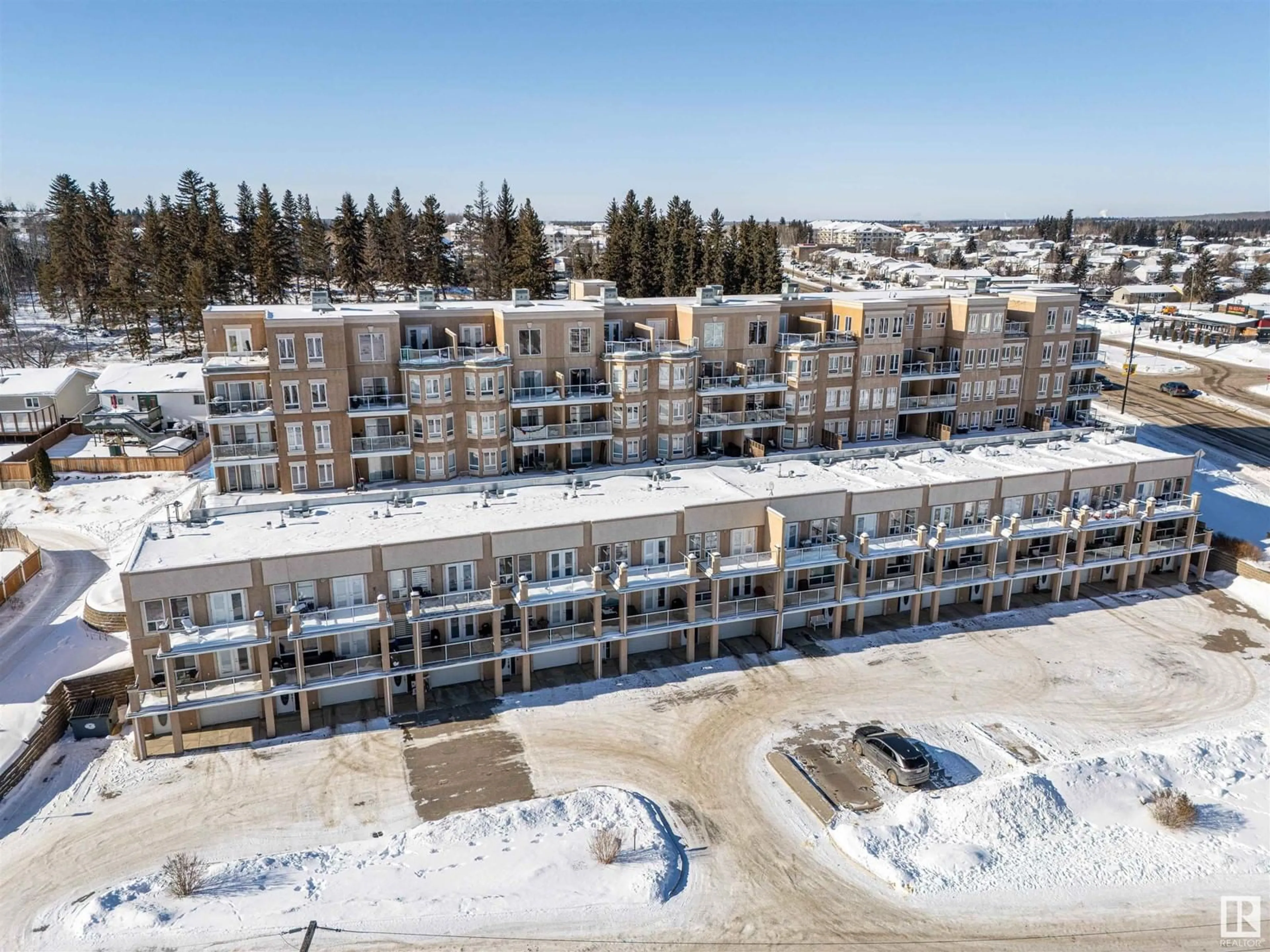 A pic from outside/outdoor area/front of a property/back of a property/a pic from drone, building for #209 802 12 ST, Cold Lake Alberta T9M0A7