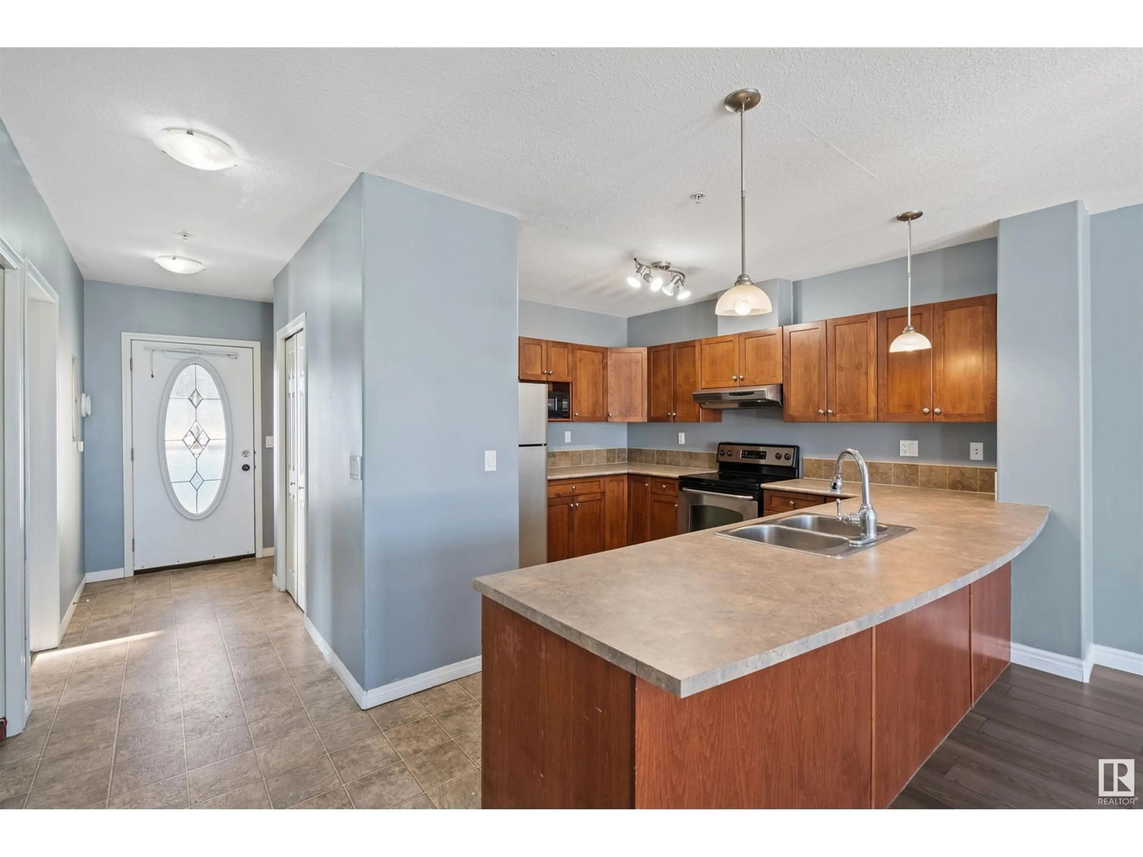 Open concept kitchen, unknown for #209 802 12 ST, Cold Lake Alberta T9M0A7