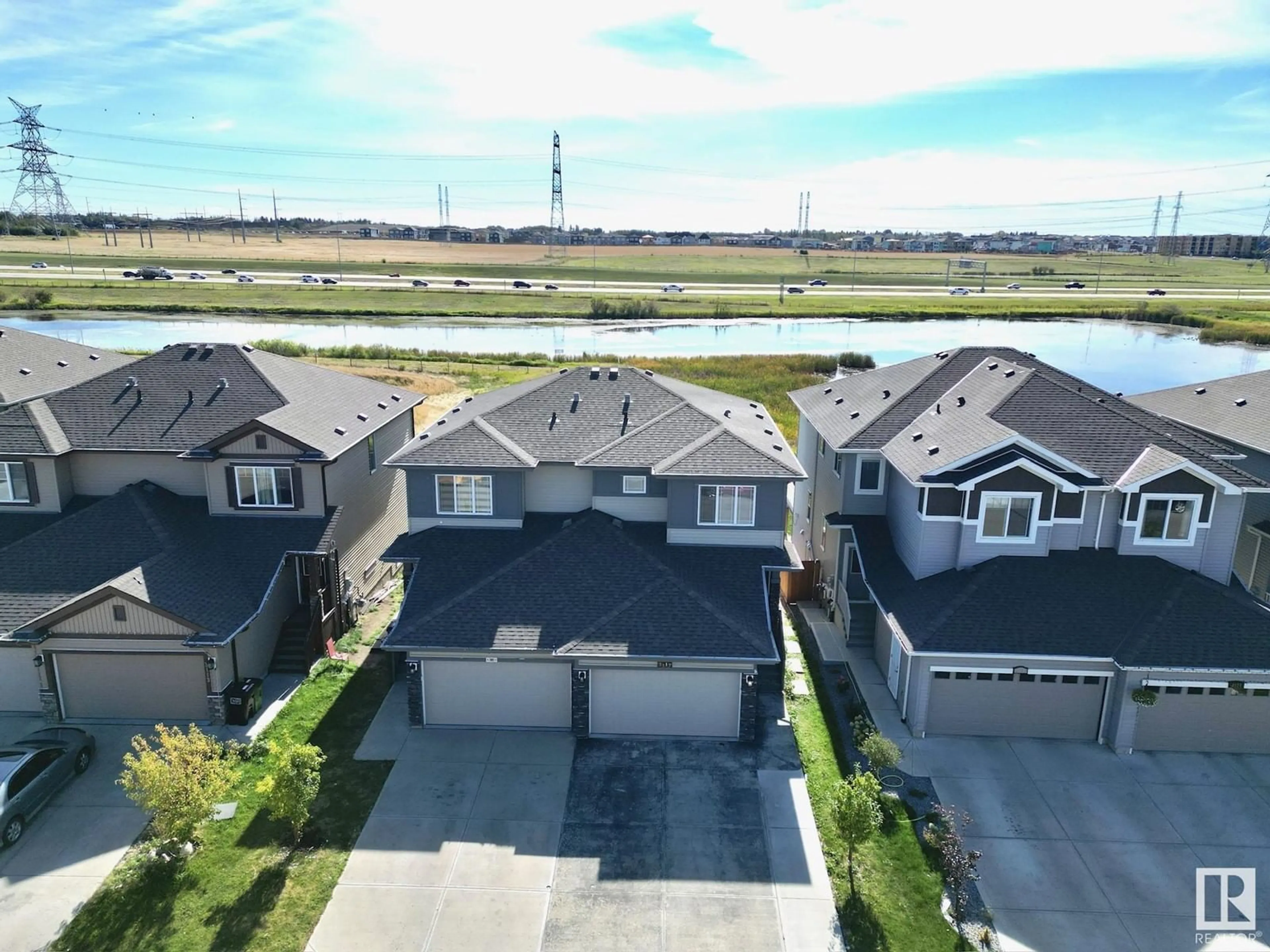 A pic from outside/outdoor area/front of a property/back of a property/a pic from drone, water/lake/river/ocean view for 3117 11 AV NW, Edmonton Alberta T6T2C7