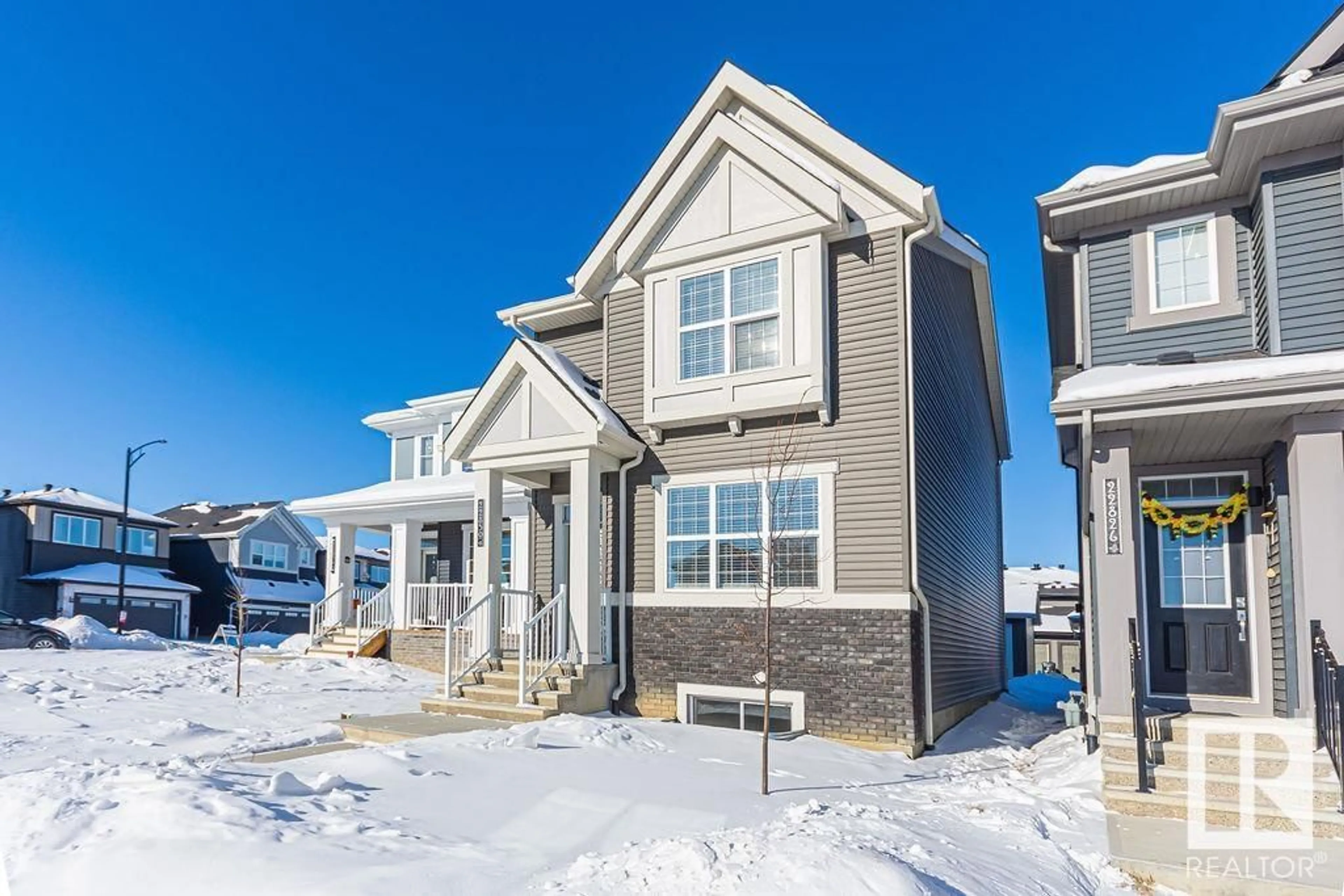 Home with vinyl exterior material, street for 22830 82A AV, Edmonton Alberta T5T4H5