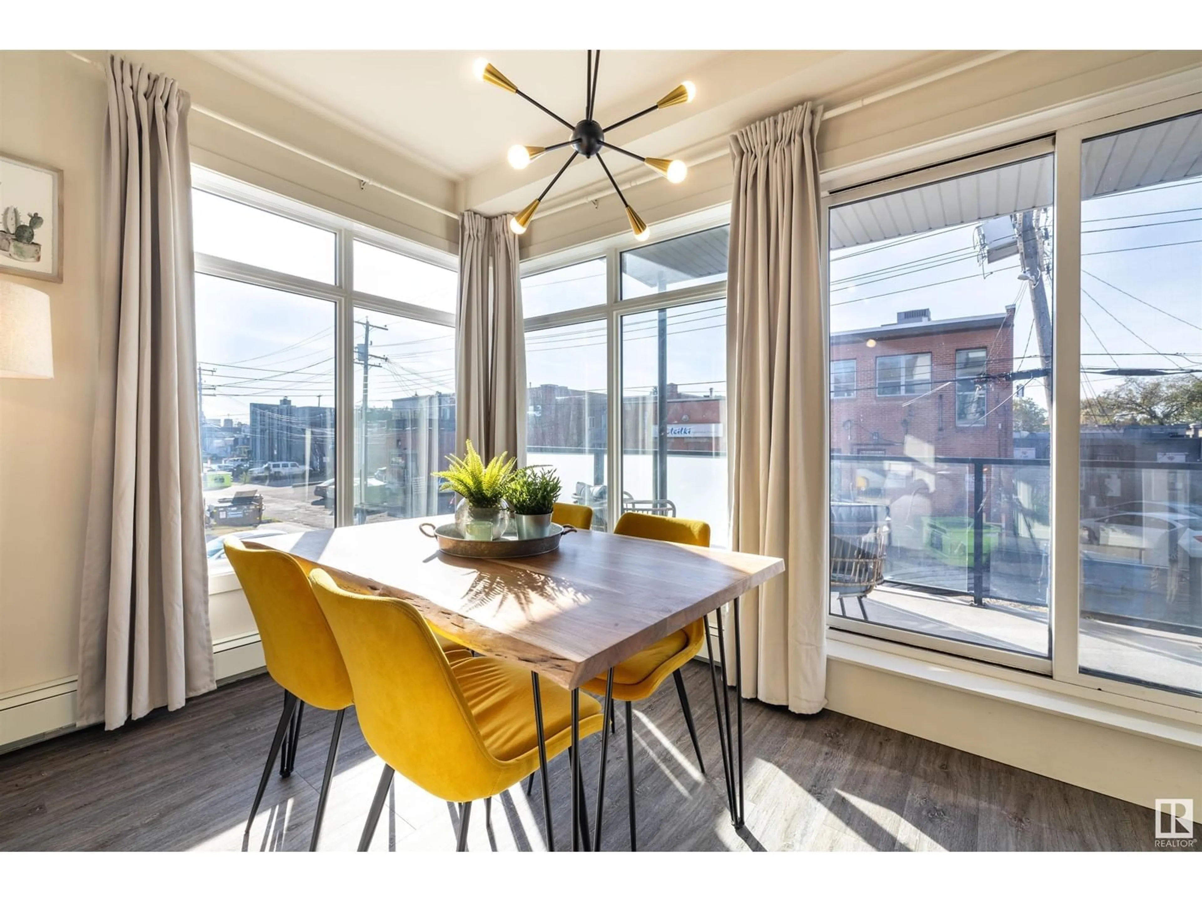 Dining room, wood/laminate floor for #203 10837 83 AV NW, Edmonton Alberta T6E2E6