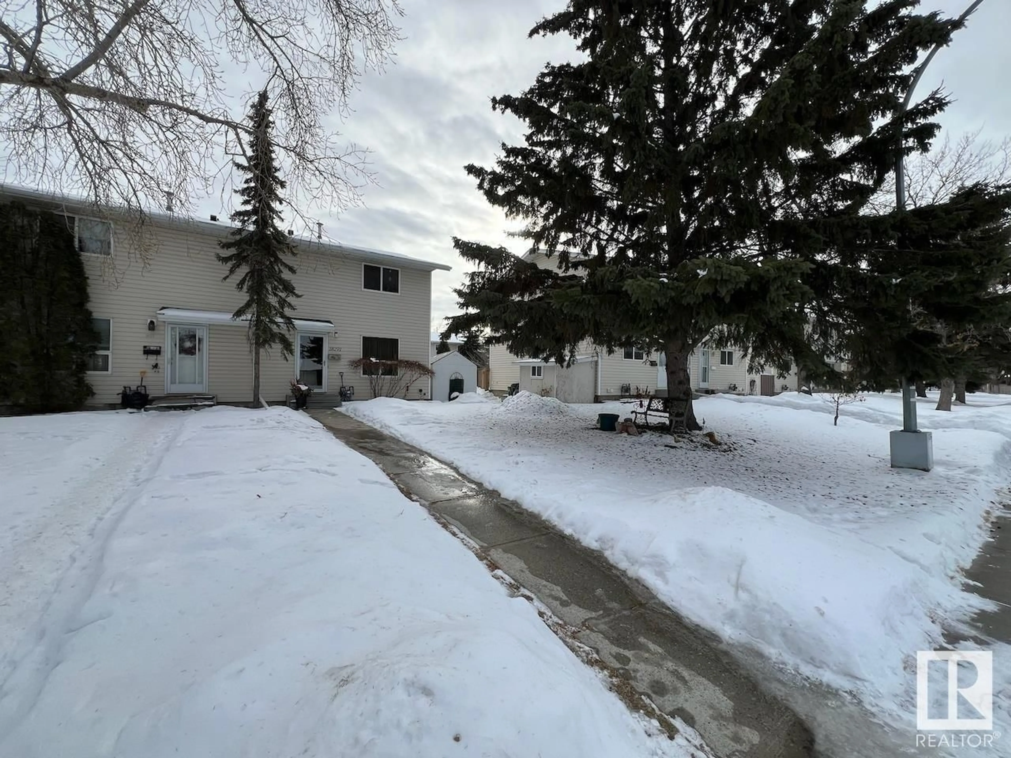 A pic from outside/outdoor area/front of a property/back of a property/a pic from drone, street for 18291 74 AV NW, Edmonton Alberta T5T2G6