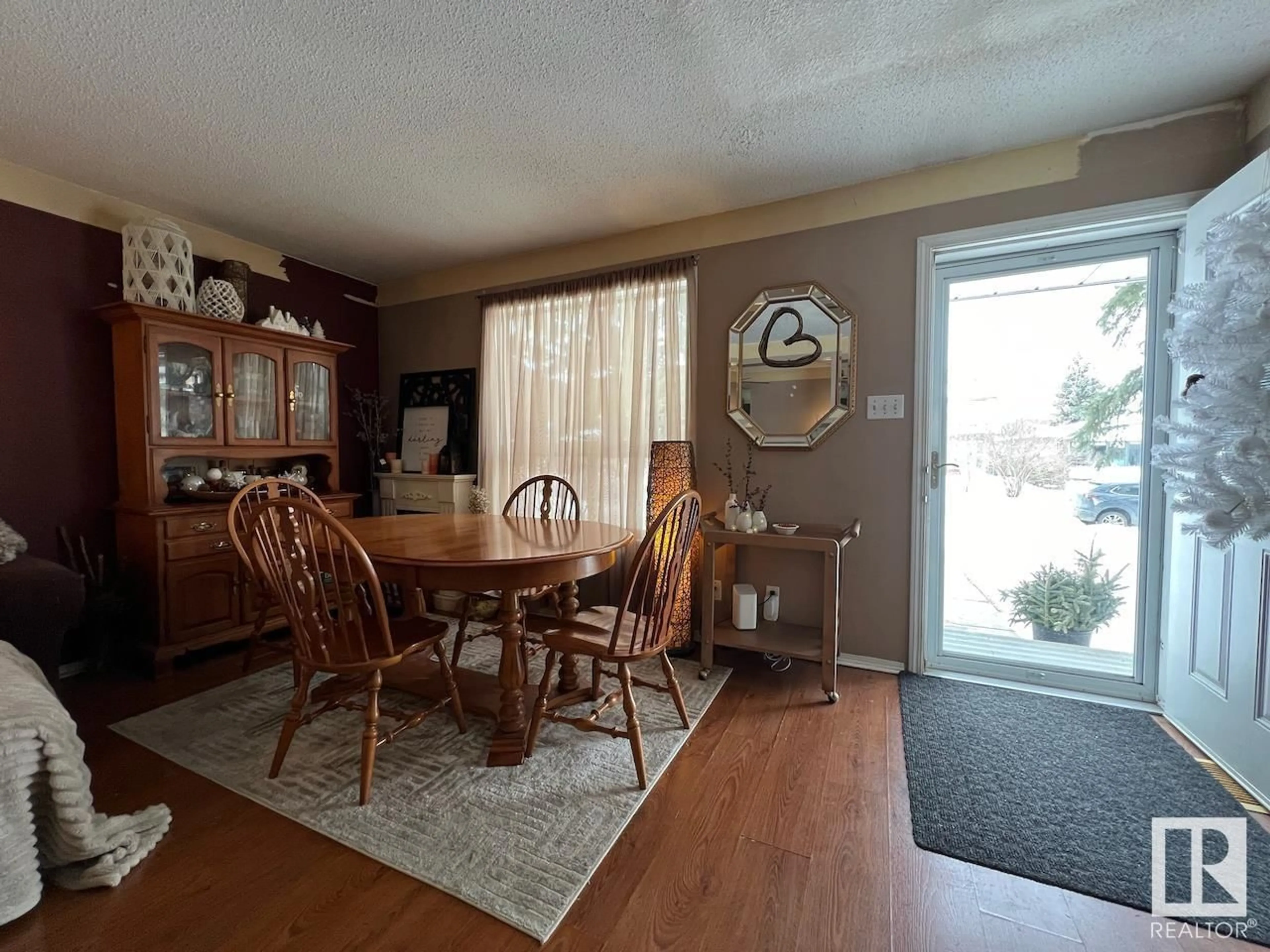 Dining room, wood/laminate floor for 18291 74 AV NW, Edmonton Alberta T5T2G6