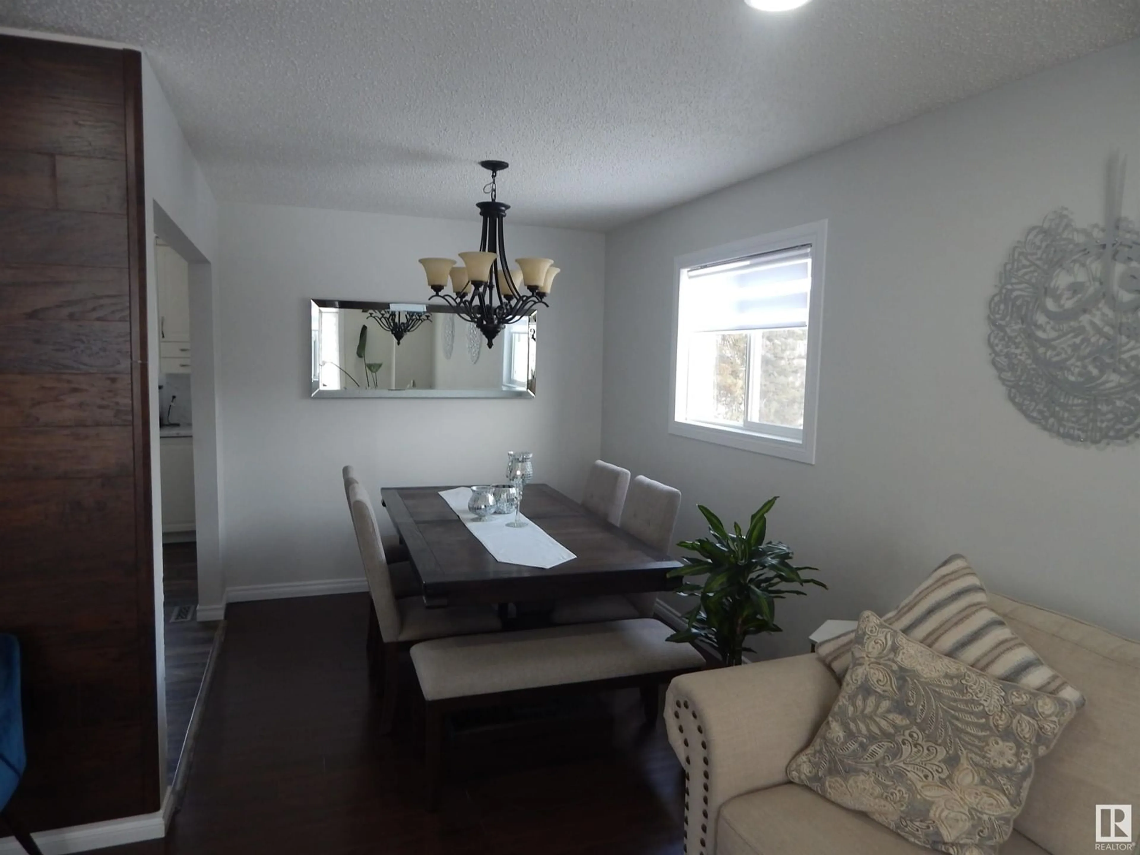 Dining room, wood/laminate floor for 12104 159 AV NW, Edmonton Alberta T5X2Y5