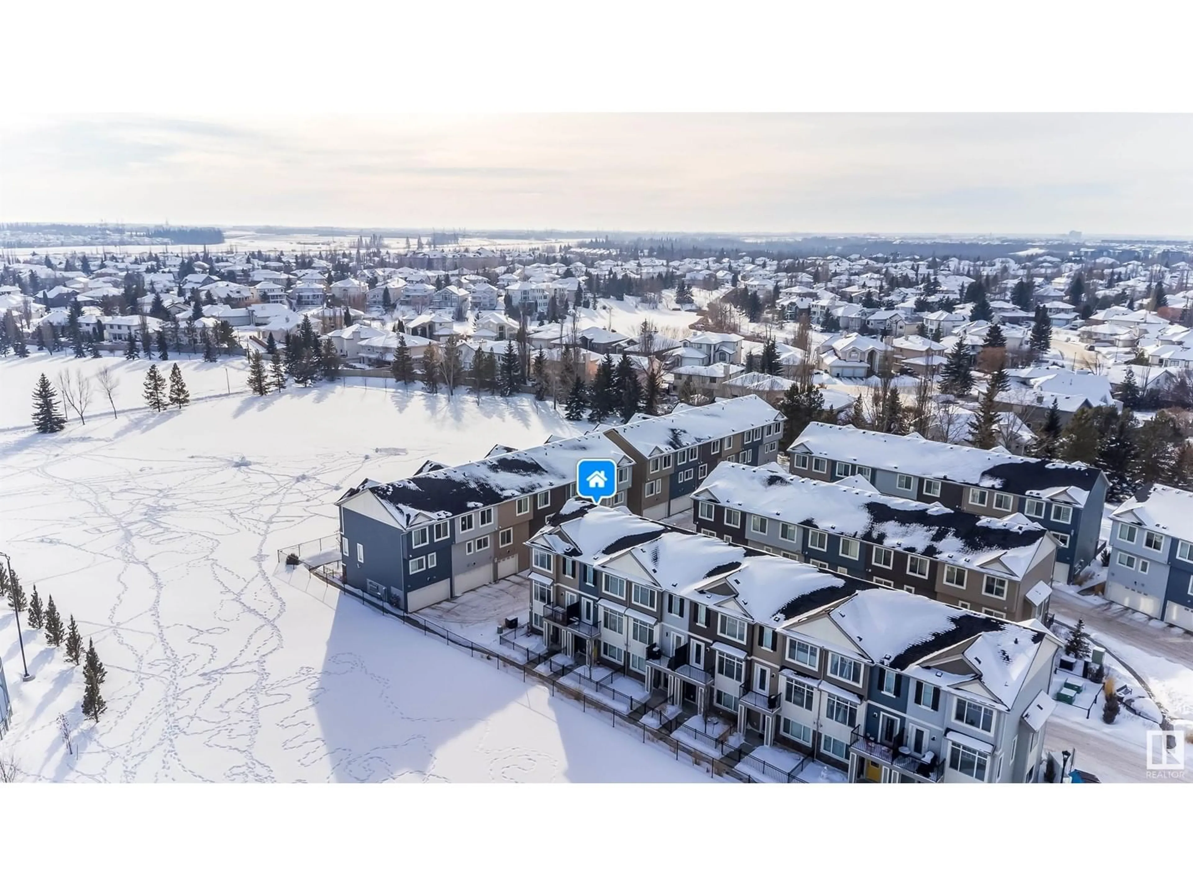 A pic from outside/outdoor area/front of a property/back of a property/a pic from drone, water/lake/river/ocean view for #7 11373 12 AV NW, Edmonton Alberta T6J5V2