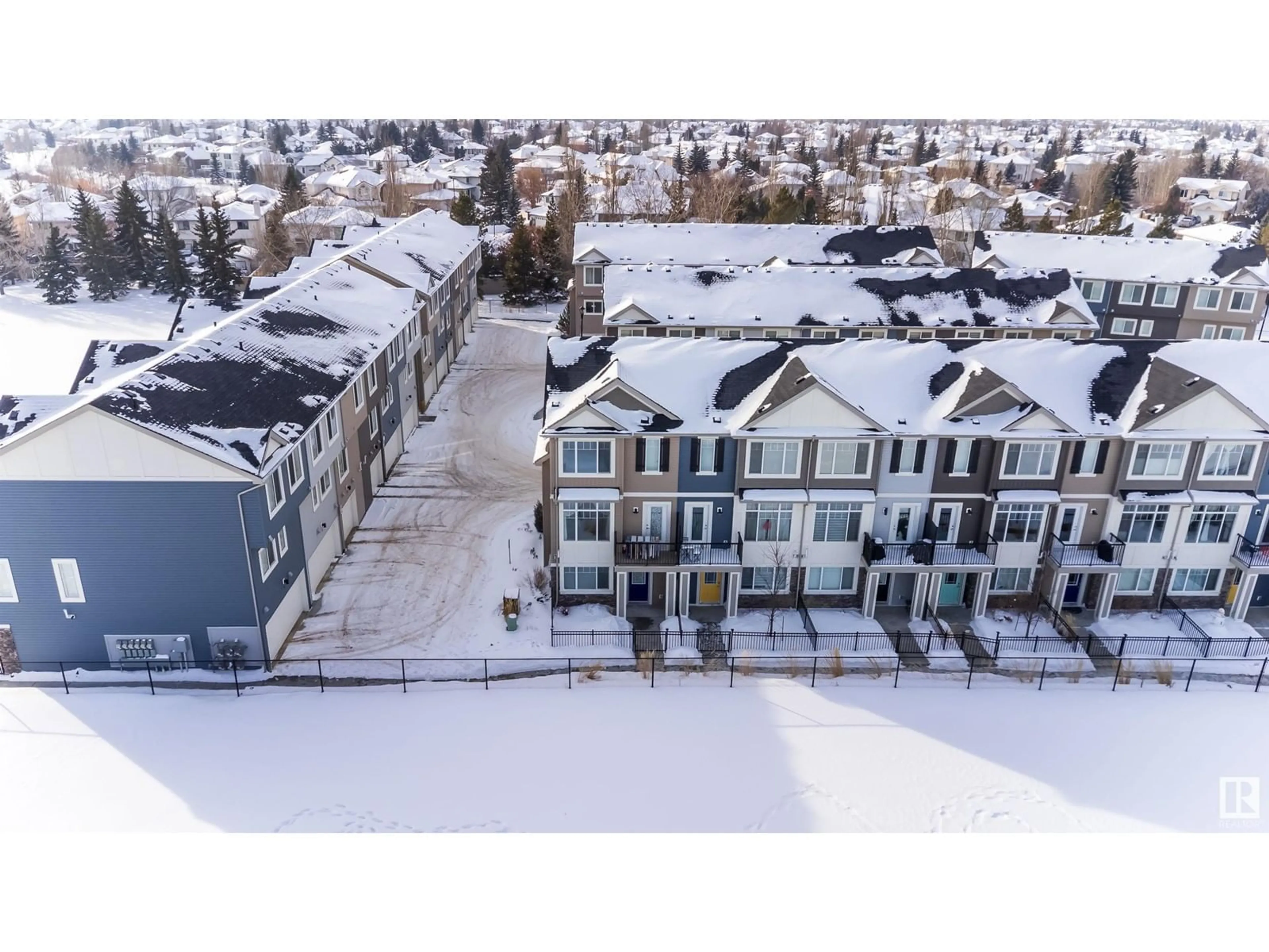 A pic from outside/outdoor area/front of a property/back of a property/a pic from drone, unknown for #7 11373 12 AV NW, Edmonton Alberta T6J5V2