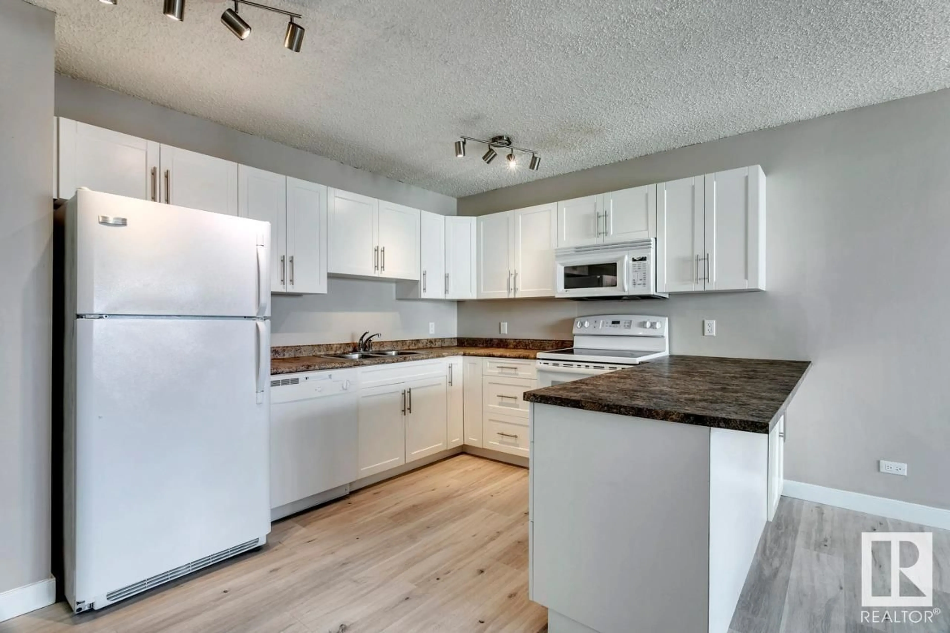 Standard kitchen, wood/laminate floor for #505 9710 105 ST NW, Edmonton Alberta T5K1A4