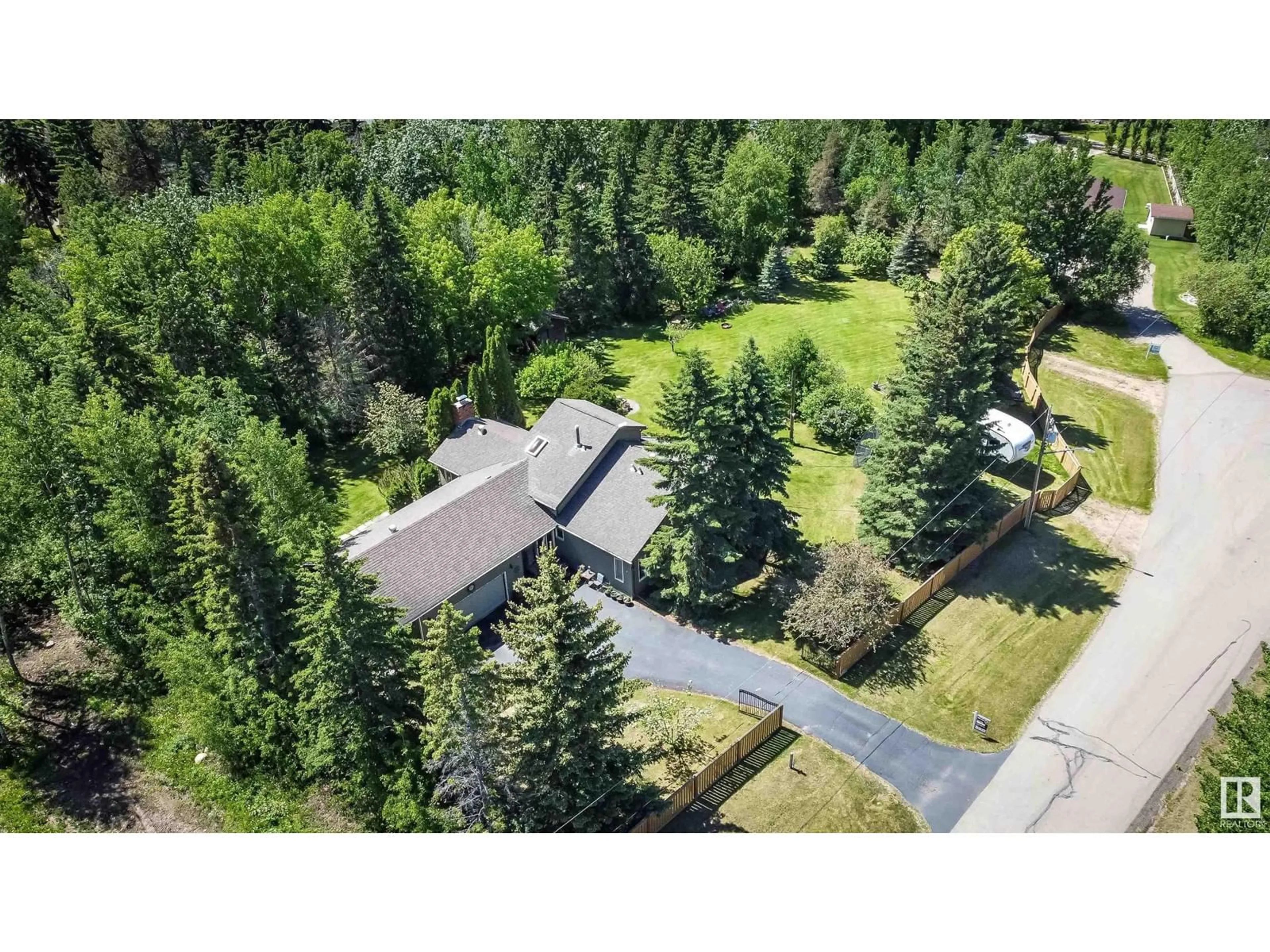 A pic from outside/outdoor area/front of a property/back of a property/a pic from drone, forest/trees view for 5622 & 5623 49 ST, Rural Lac Ste. Anne County Alberta T0E0A0