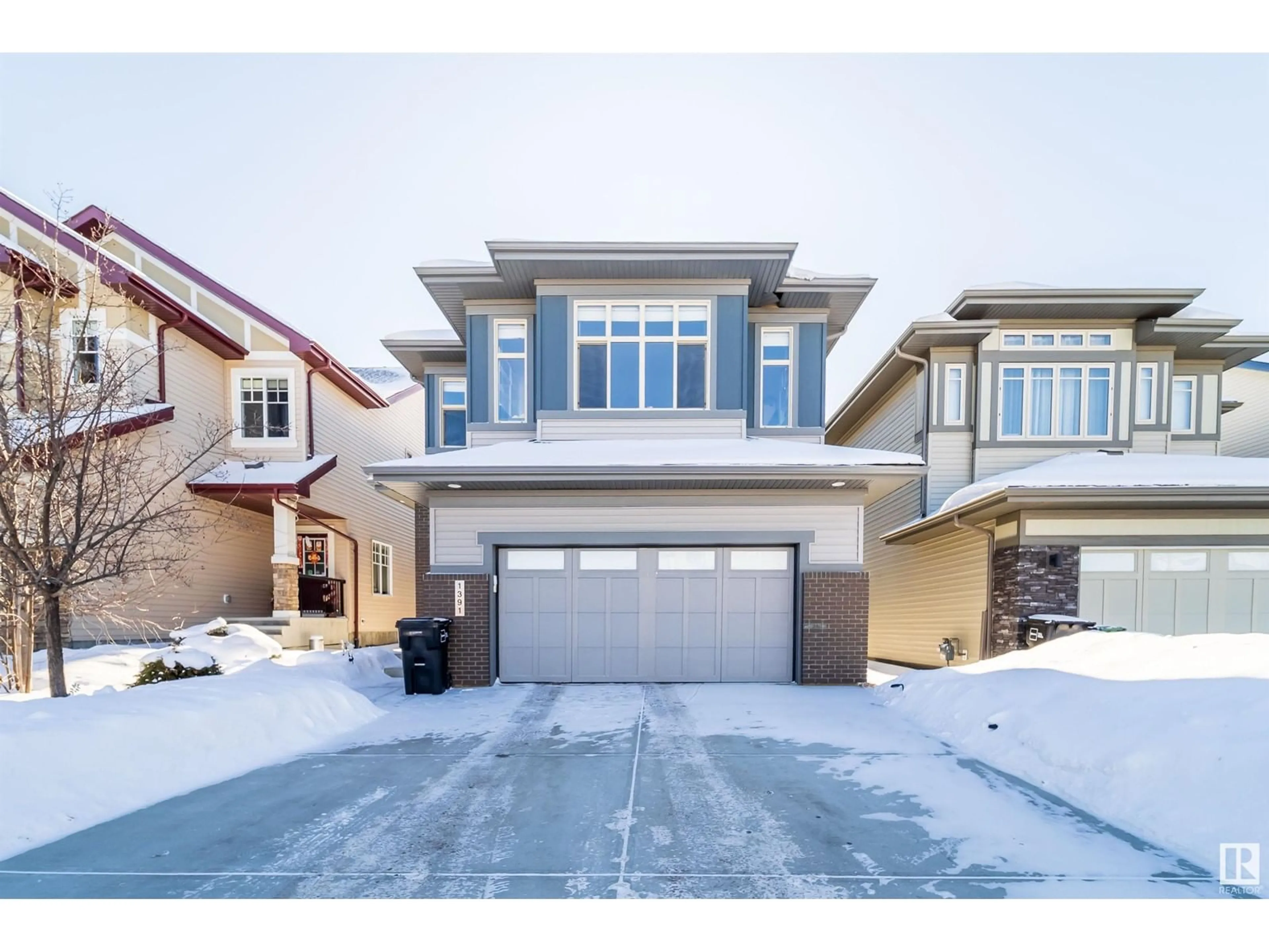 Home with brick exterior material, street for 1391 AINSLIE WD SW, Edmonton Alberta T6W3E9