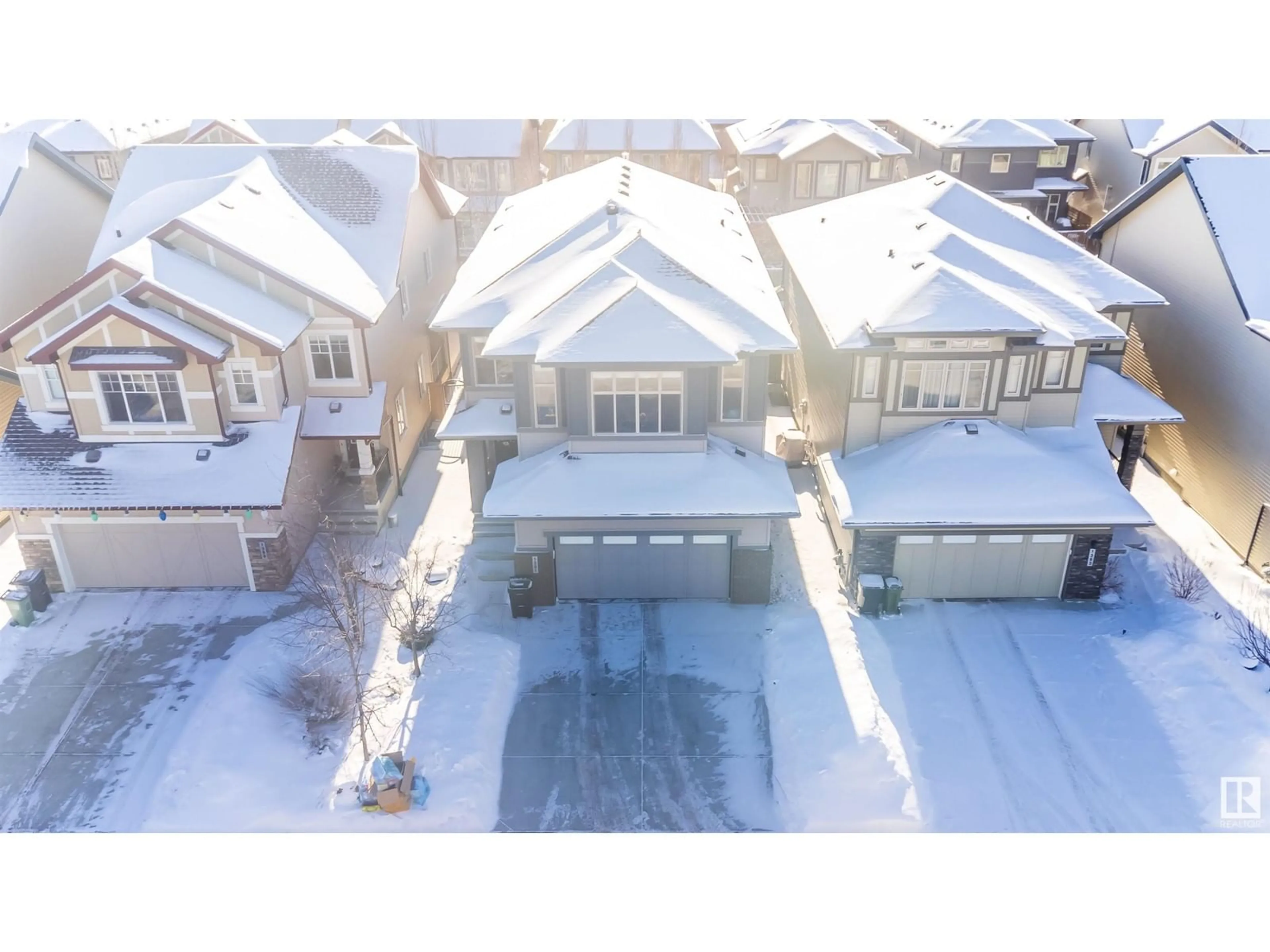 A pic from outside/outdoor area/front of a property/back of a property/a pic from drone, street for 1391 AINSLIE WD SW, Edmonton Alberta T6W3E9