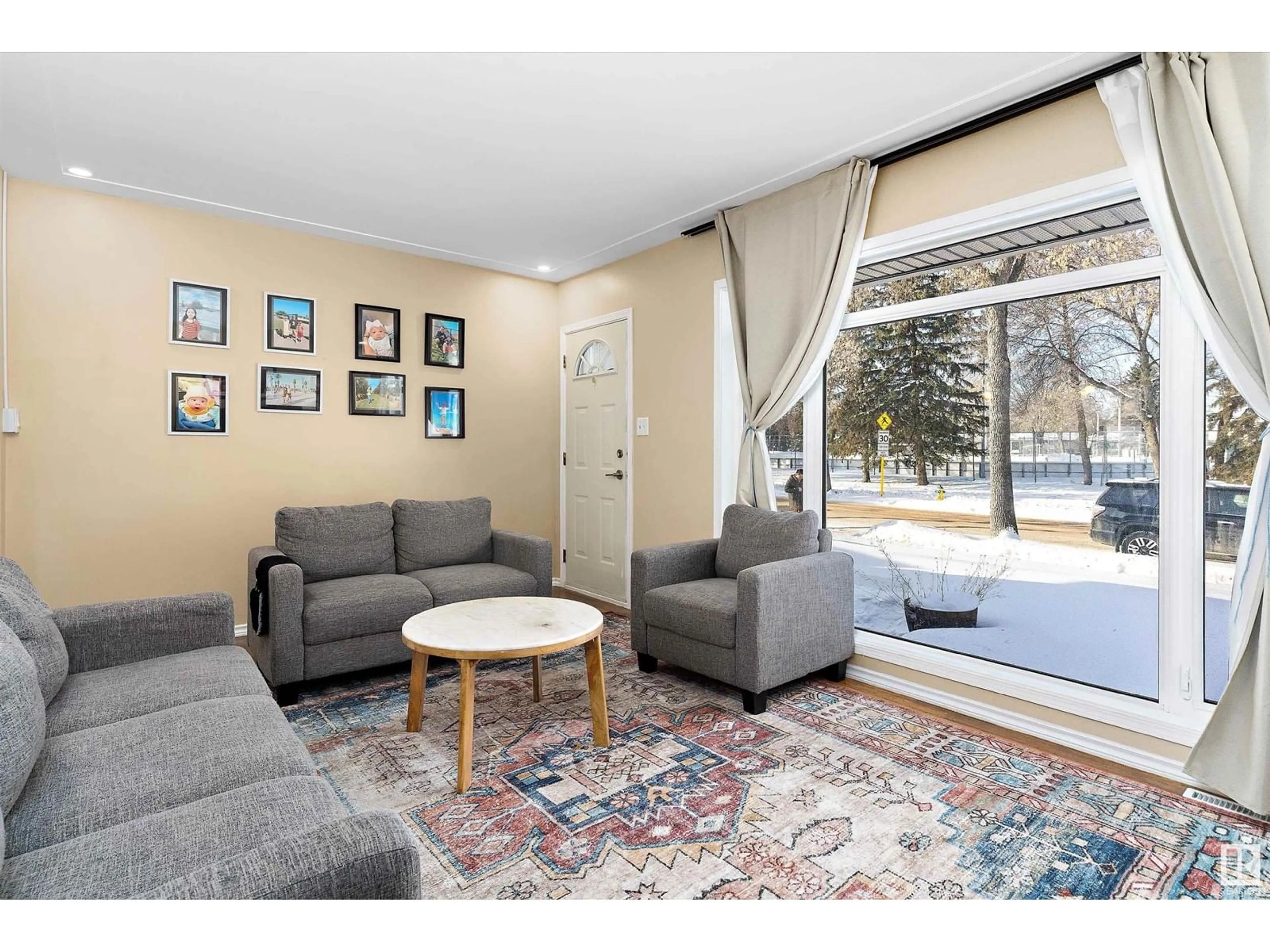 Living room with furniture, unknown for 12025 42 ST NW, Edmonton Alberta T5W2N7