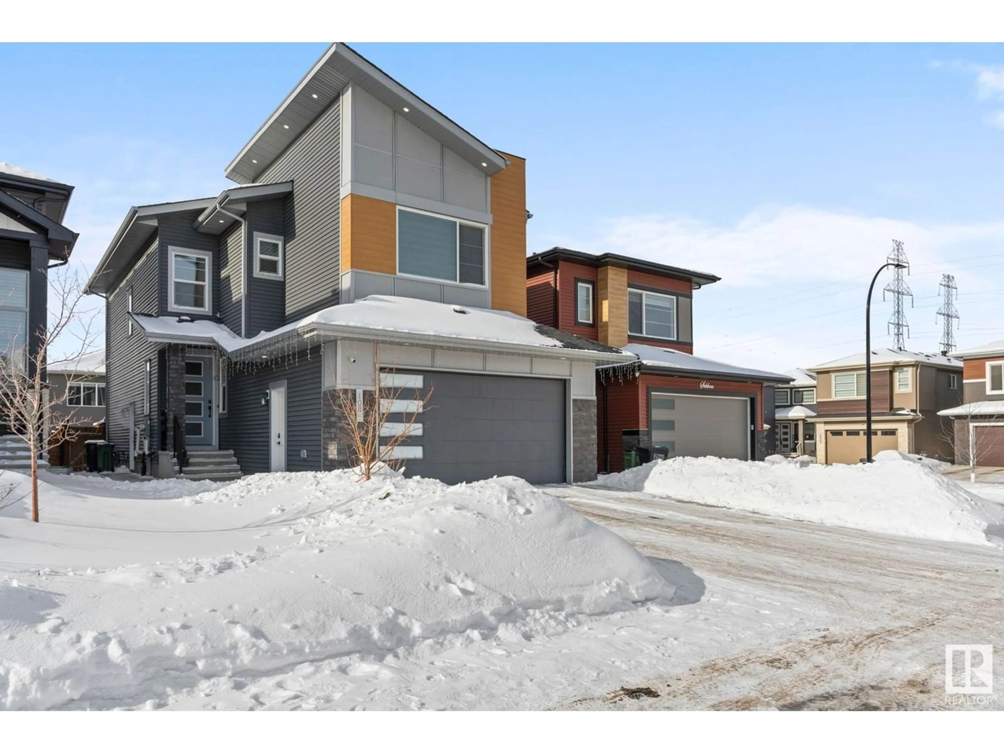 Home with brick exterior material, street for 108 37 ST SW, Edmonton Alberta T6X2W4