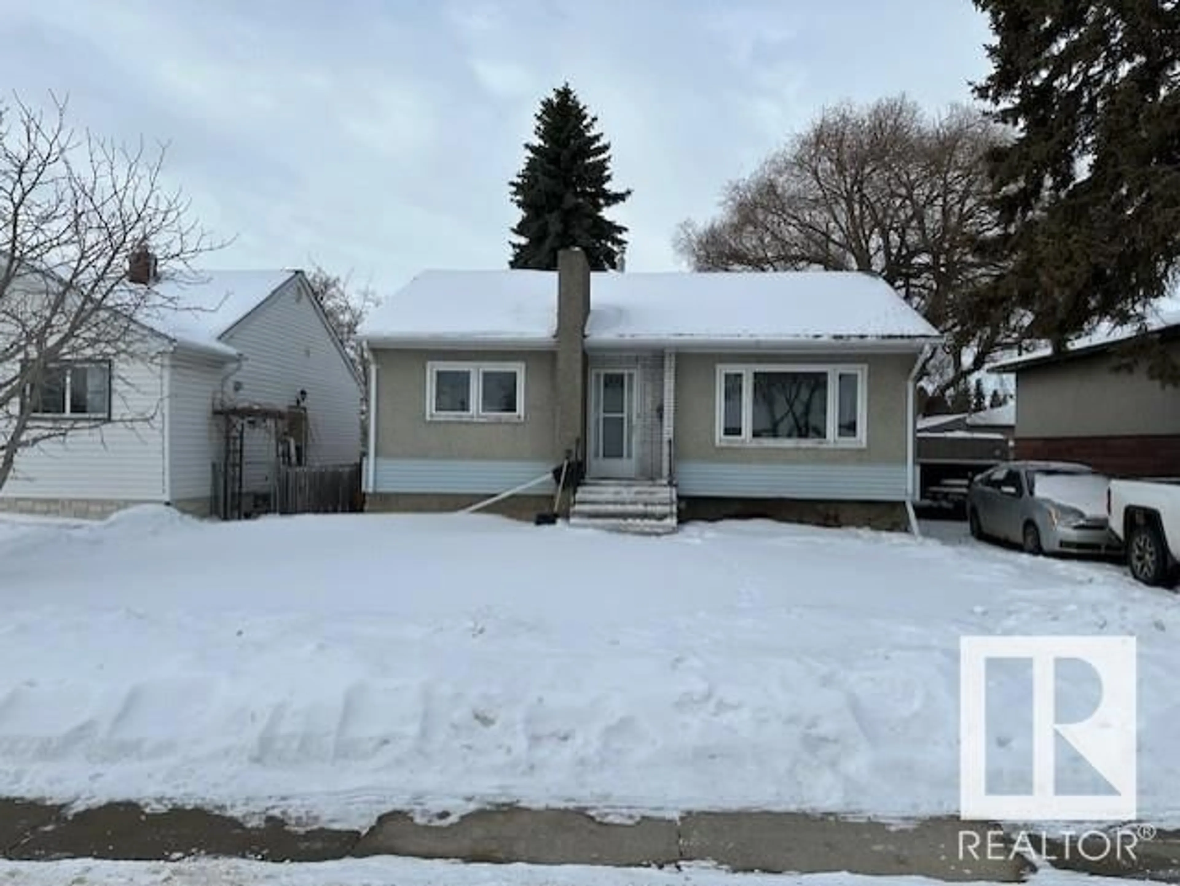 Home with vinyl exterior material, street for 9016 151 ST NW, Edmonton Alberta T5R1J3