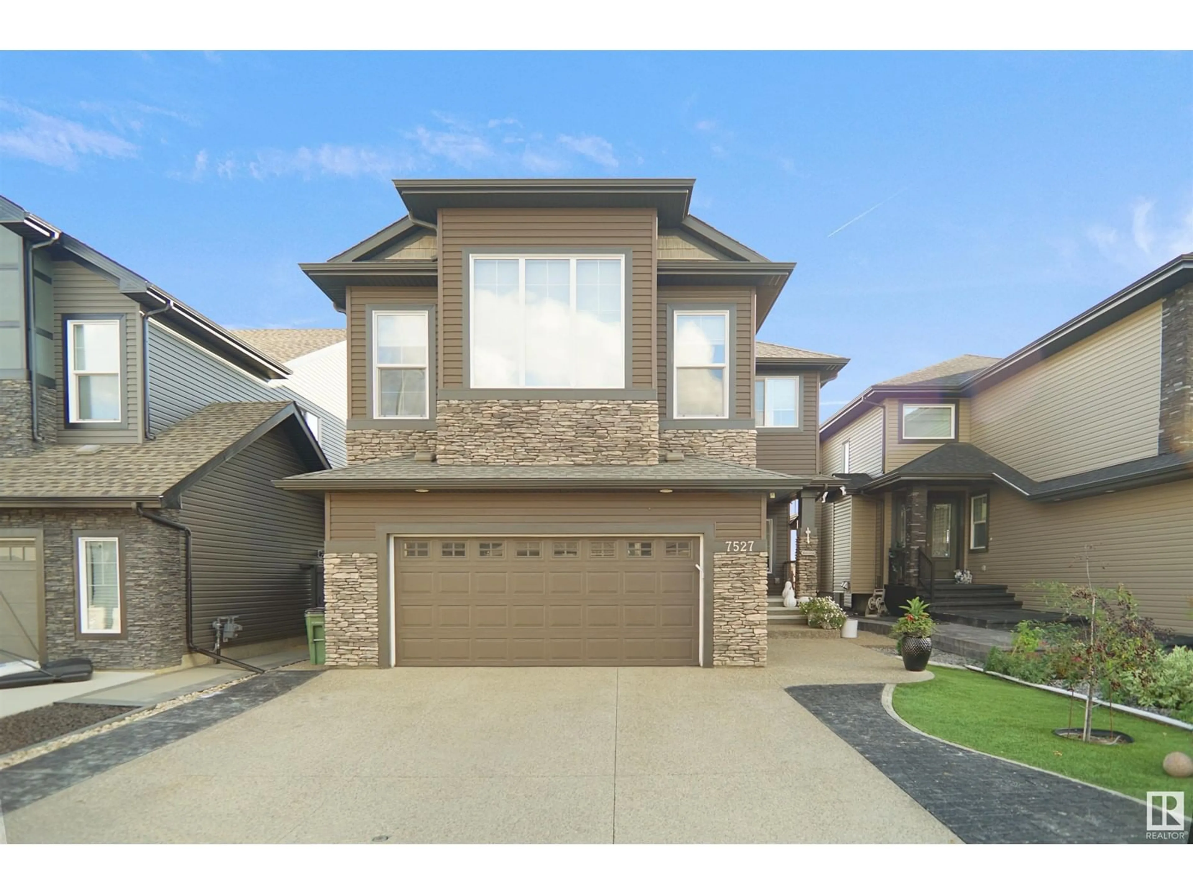 Home with brick exterior material, street for 7527 173 AV NW, Edmonton Alberta T5Z0N6