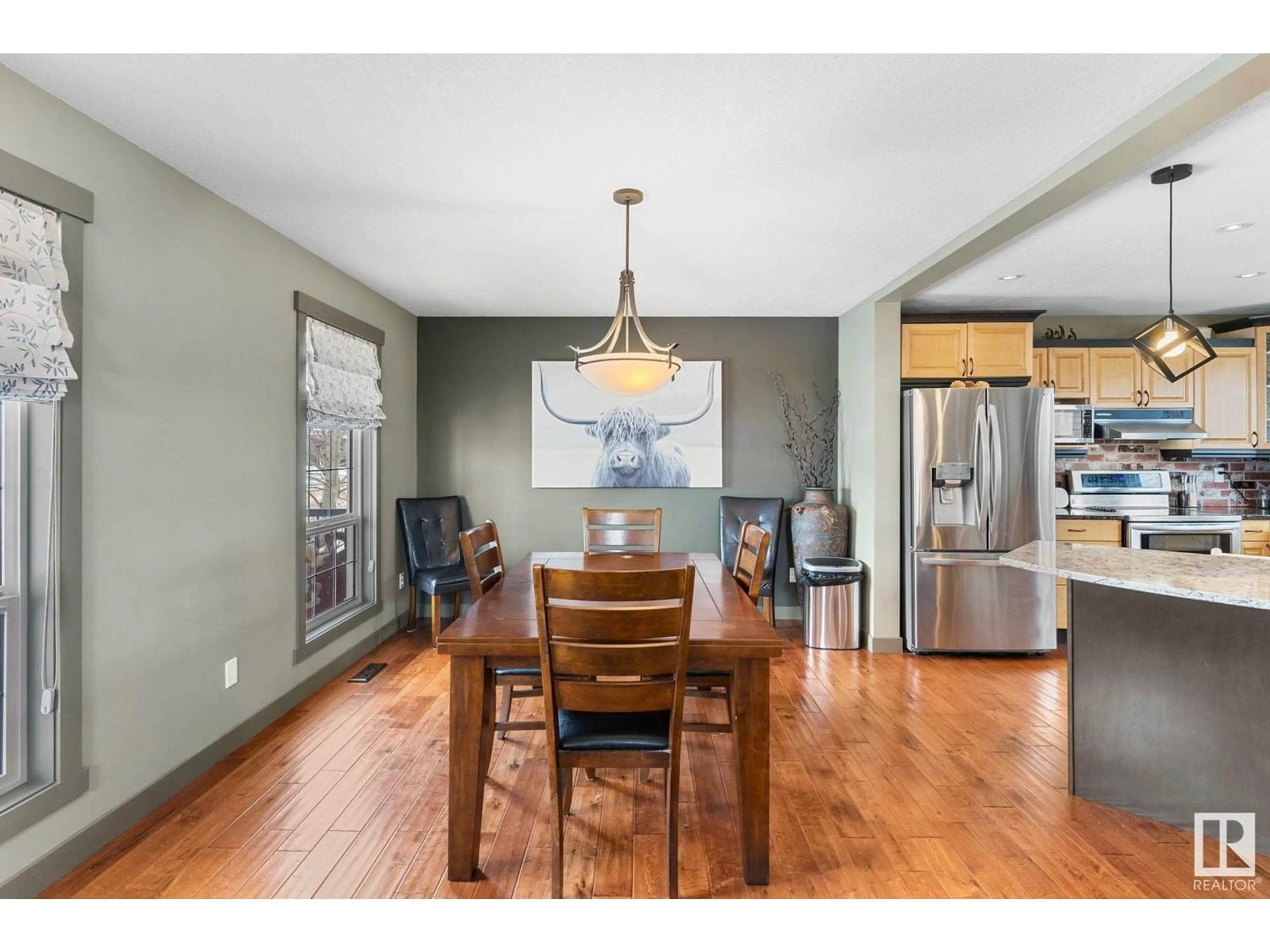 Open concept kitchen, wood/laminate floor for 129 DAWSON CR, Sherwood Park Alberta T8H1W8