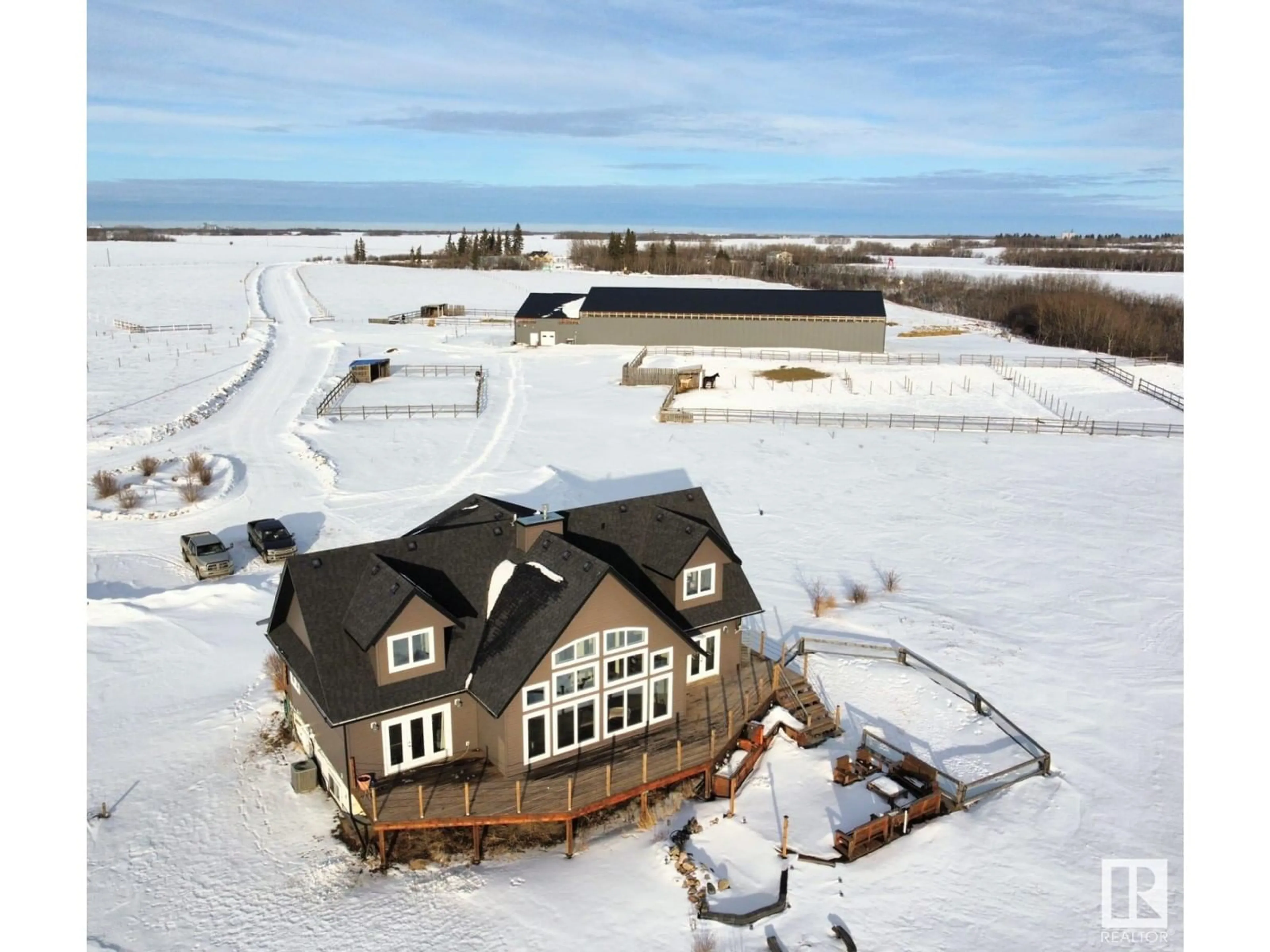 A pic from outside/outdoor area/front of a property/back of a property/a pic from drone, water/lake/river/ocean view for 20213 Township Road 460, Rural Camrose County Alberta T4V2M9