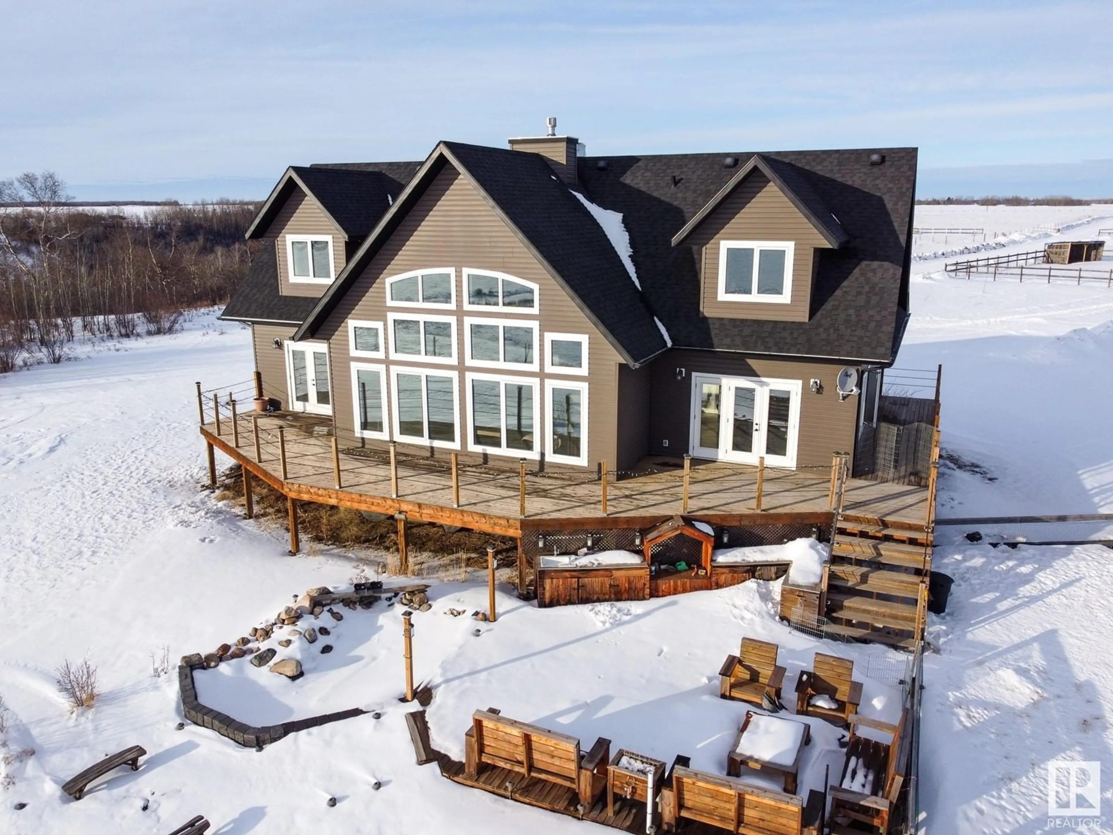 A pic from outside/outdoor area/front of a property/back of a property/a pic from drone, building for 20213 Township Road 460, Rural Camrose County Alberta T4V2M9