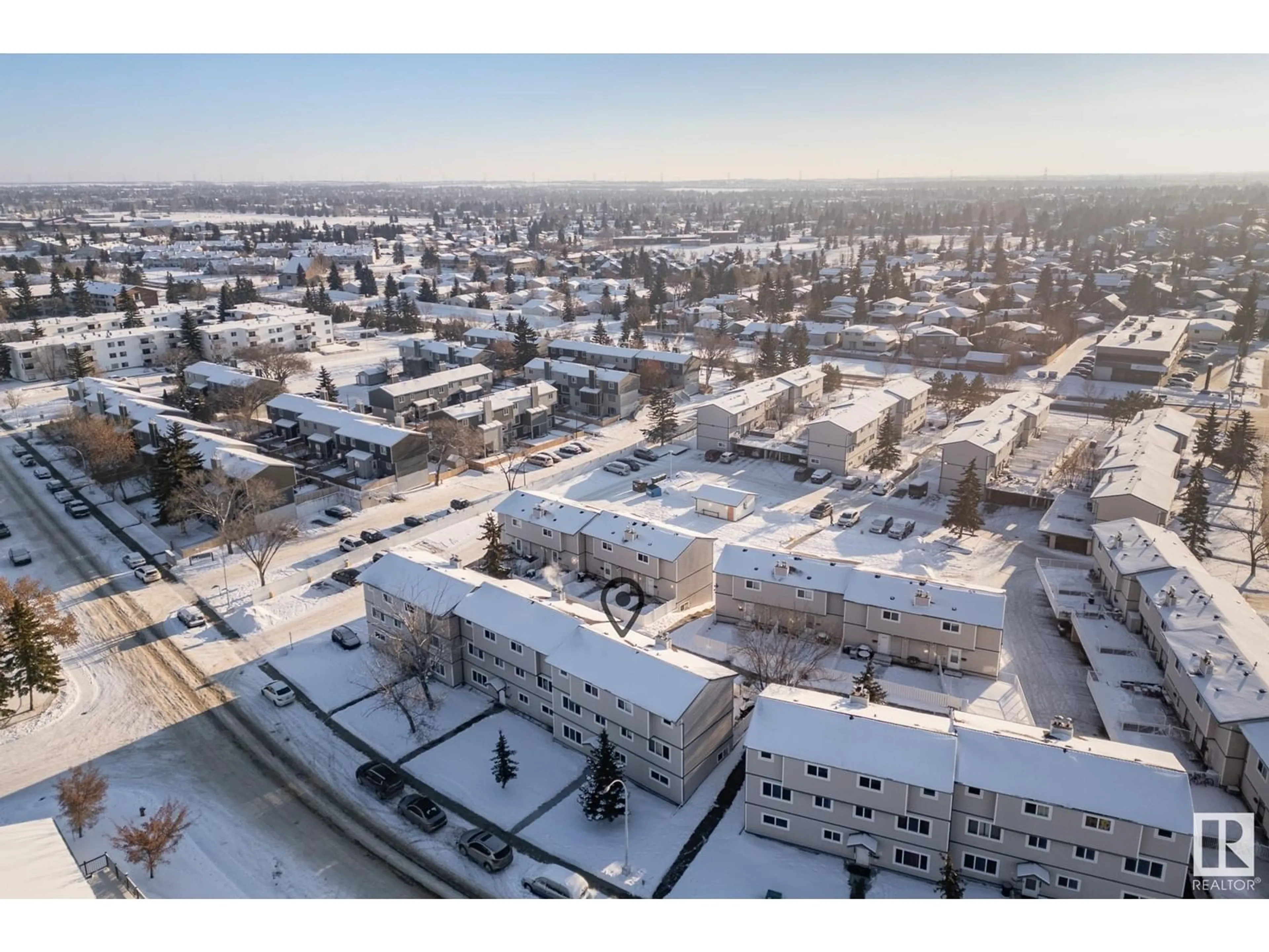 A pic from outside/outdoor area/front of a property/back of a property/a pic from drone, unknown for 8439 29 AV NW, Edmonton Alberta T6K3M8