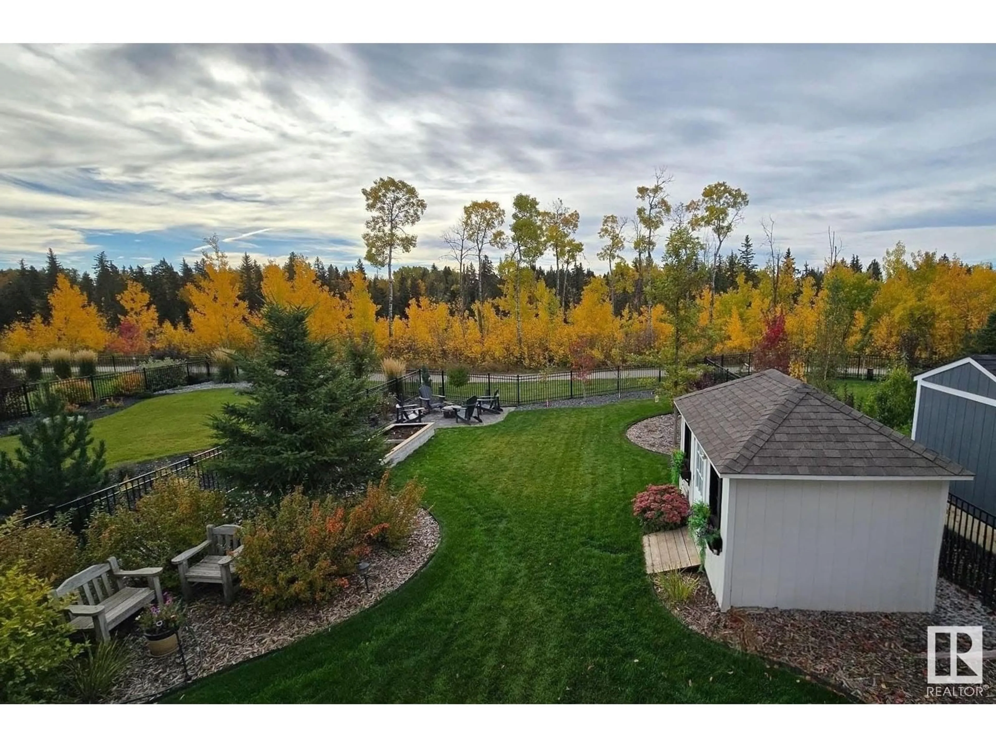 A pic from outside/outdoor area/front of a property/back of a property/a pic from drone, forest/trees view for 439 EDGEMONT RD NW, Edmonton Alberta T6M0Y7