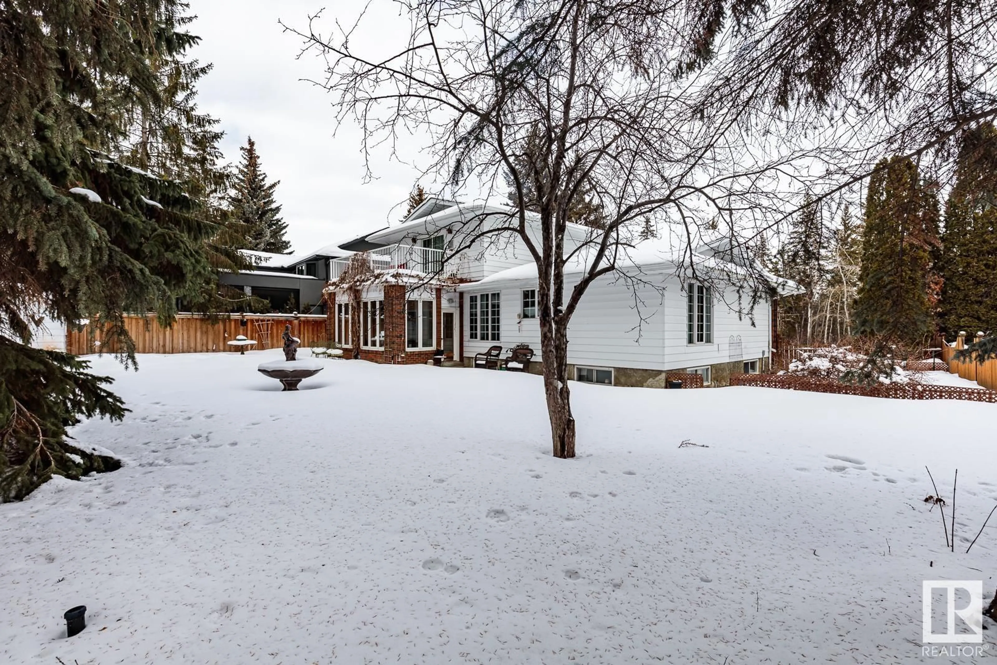 A pic from outside/outdoor area/front of a property/back of a property/a pic from drone, mountain view for 206 Wolf Willow CR NW, Edmonton Alberta T5T1T2