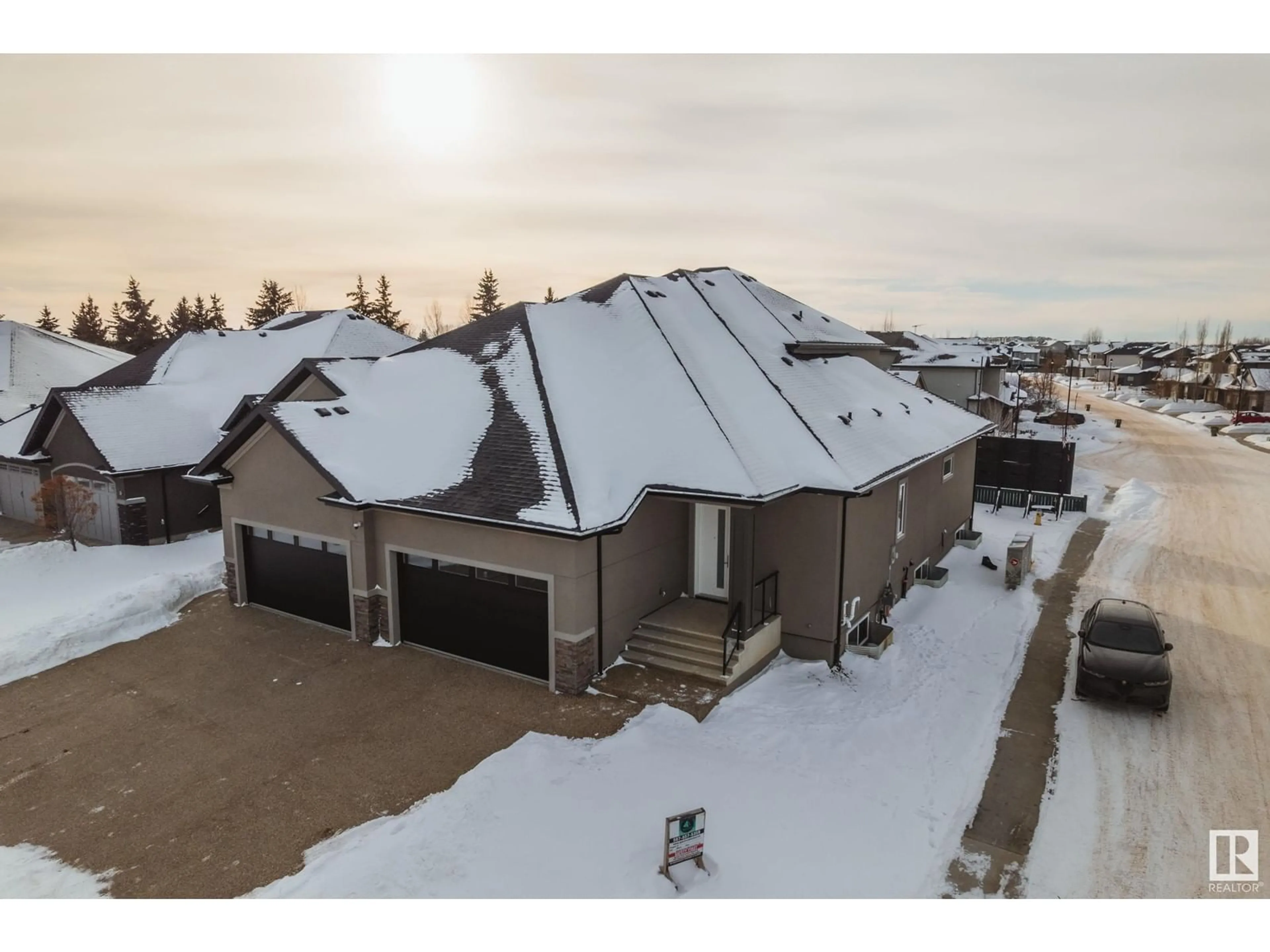 A pic from outside/outdoor area/front of a property/back of a property/a pic from drone, street for #1 20425 93 AV NW, Edmonton Alberta T5T7C7