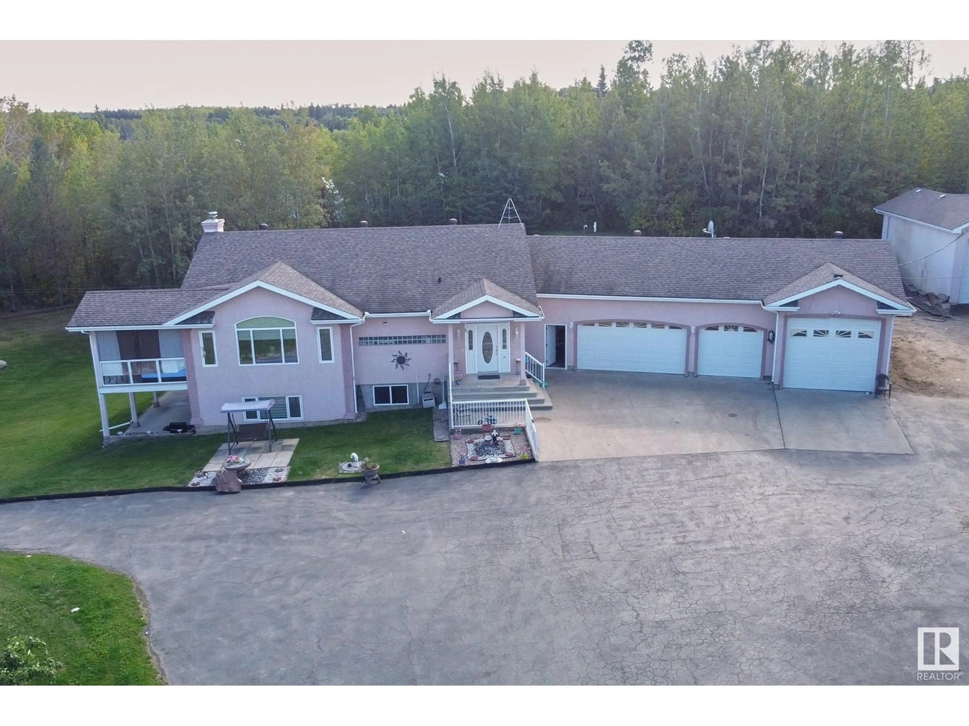 A pic from outside/outdoor area/front of a property/back of a property/a pic from drone, unknown for 23020 TWP ROAD 522 NW, Rural Strathcona County Alberta T8B1H1