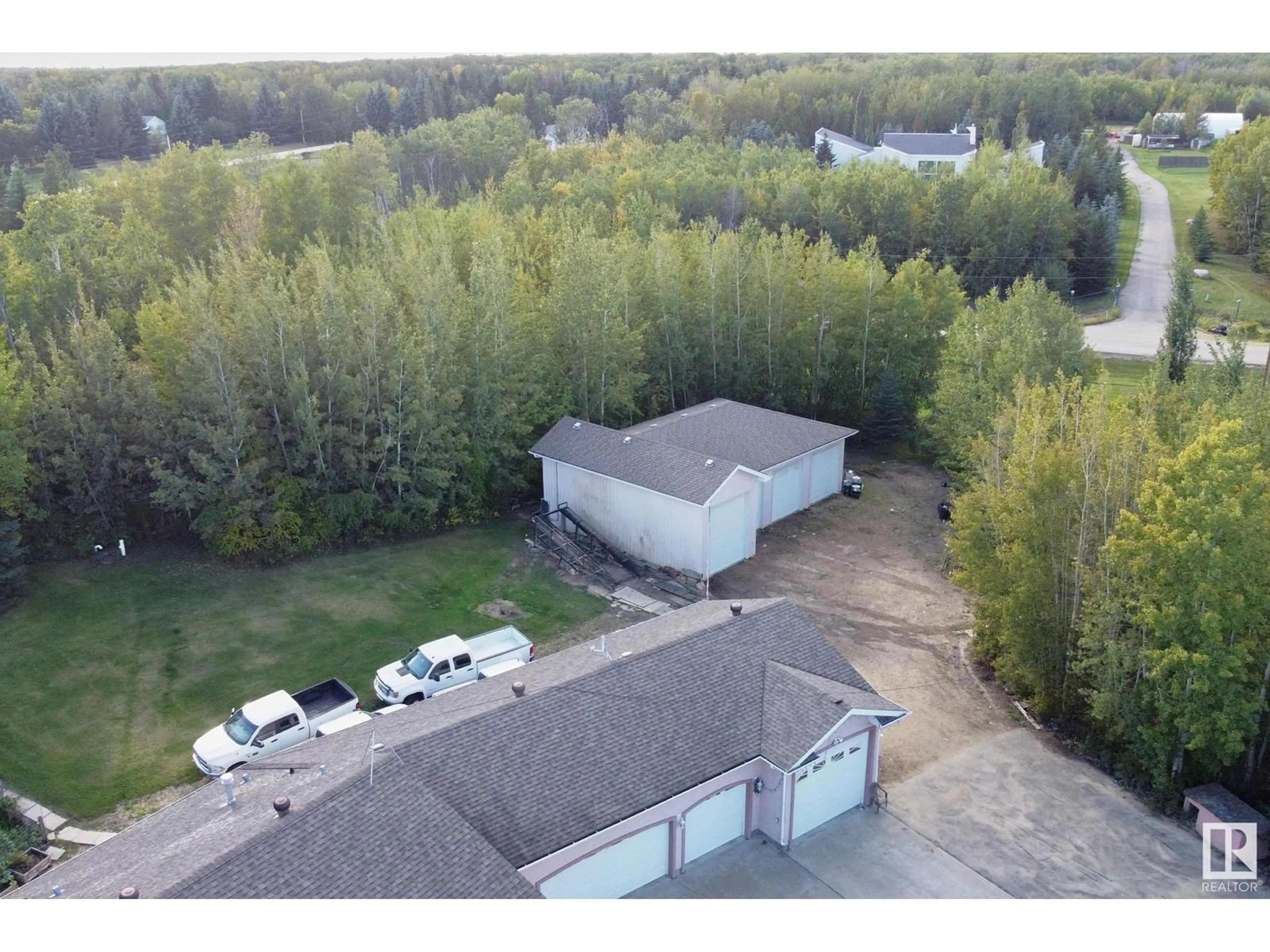 A pic from outside/outdoor area/front of a property/back of a property/a pic from drone, unknown for 23020 TWP ROAD 522 NW, Rural Strathcona County Alberta T8B1H1