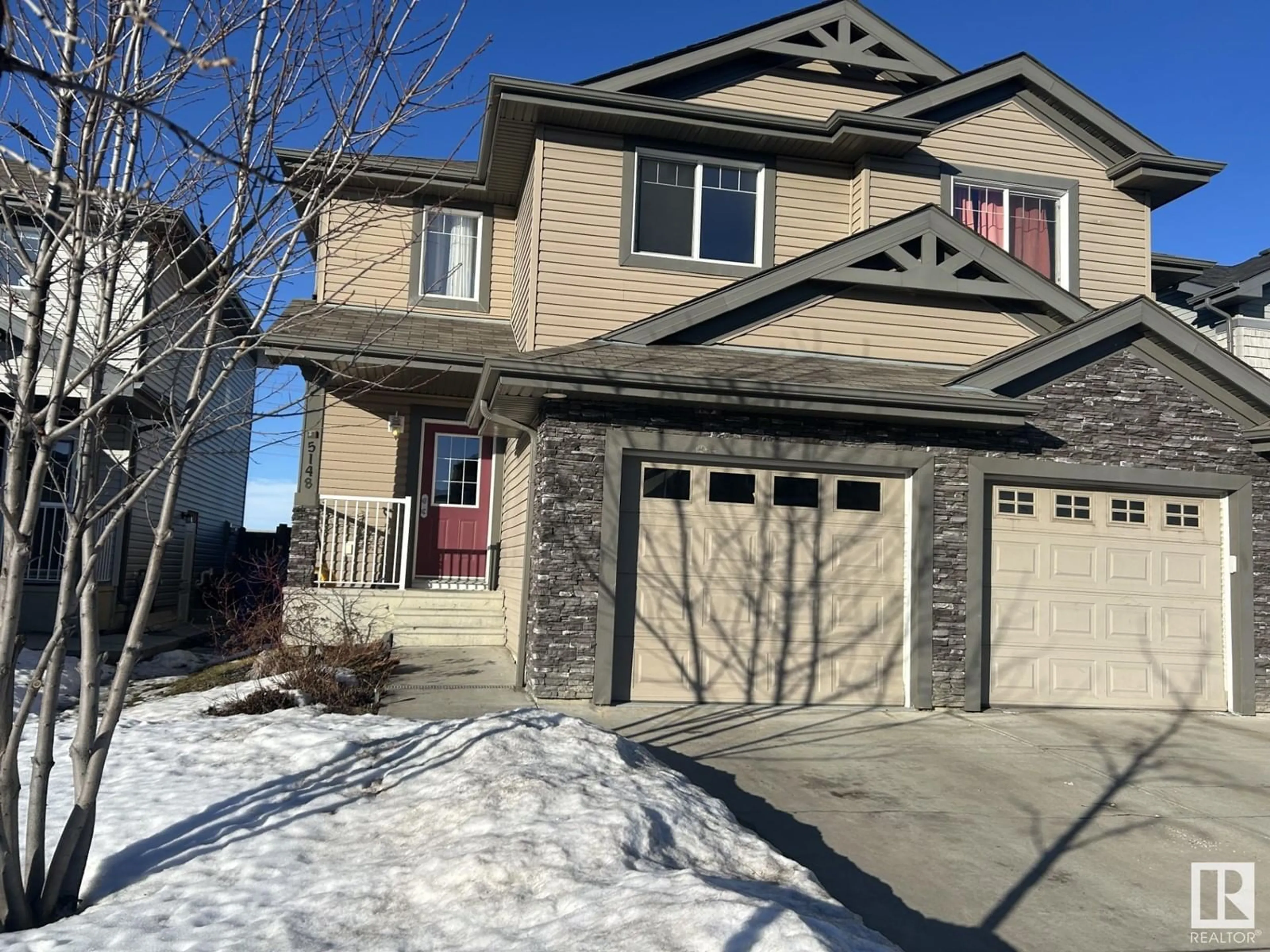 Home with vinyl exterior material, street for 5148 1A AV SW, Edmonton Alberta T6X0X3