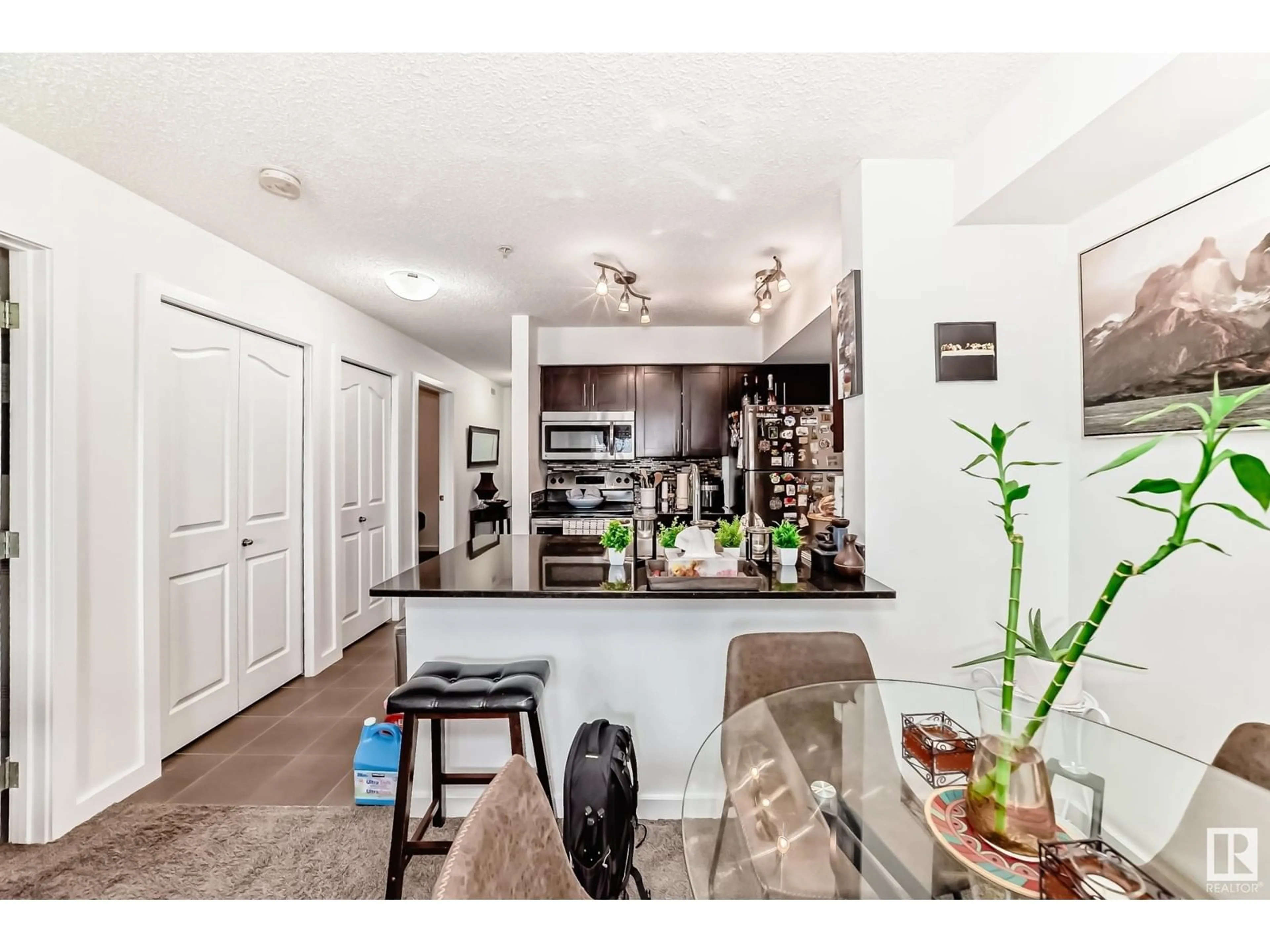 Open concept kitchen, unknown for #104 12045 22 AV SW, Edmonton Alberta T6W2Y2