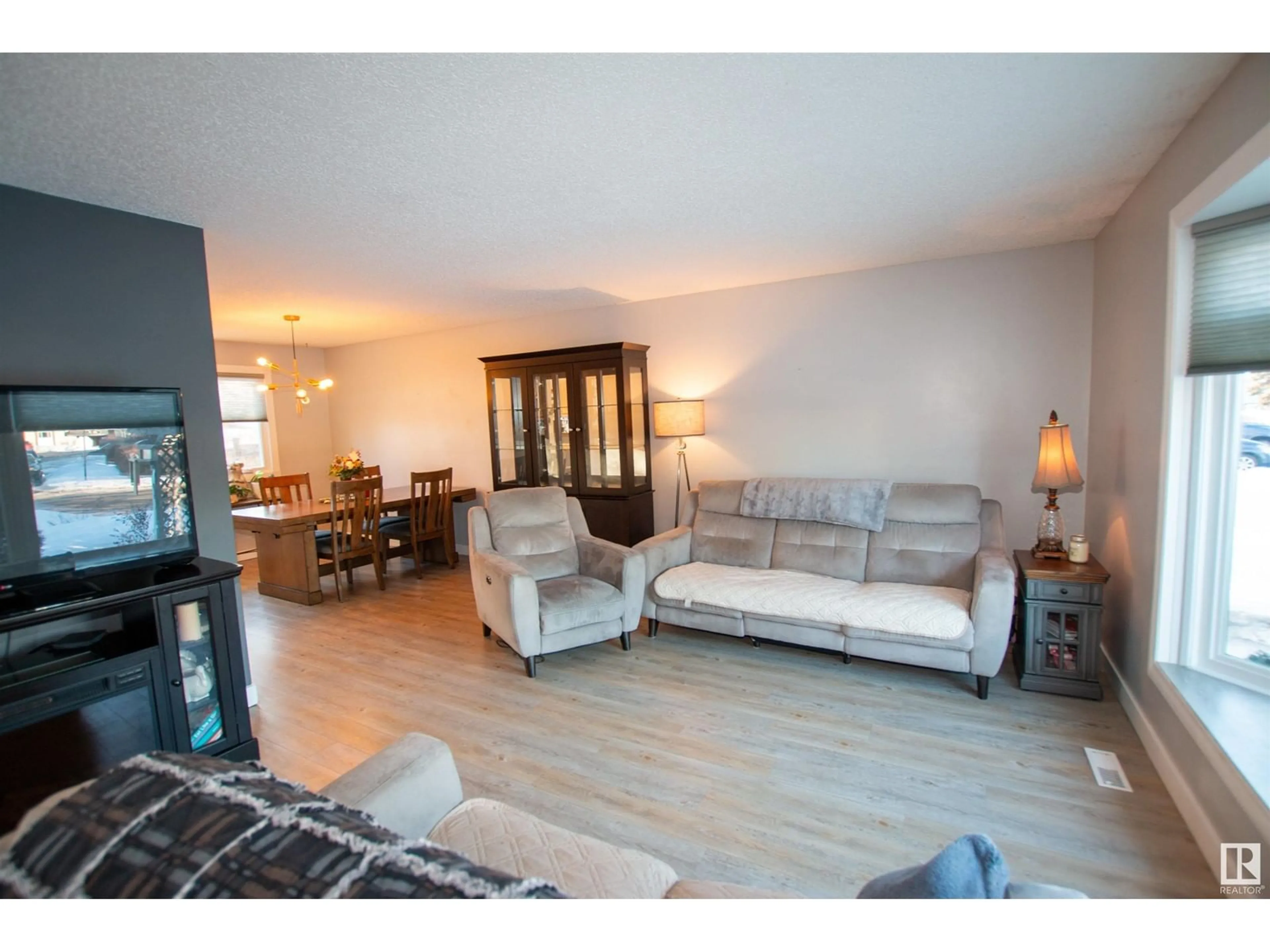 Living room with furniture, unknown for 9801 95 AV, Morinville Alberta T8R1H3