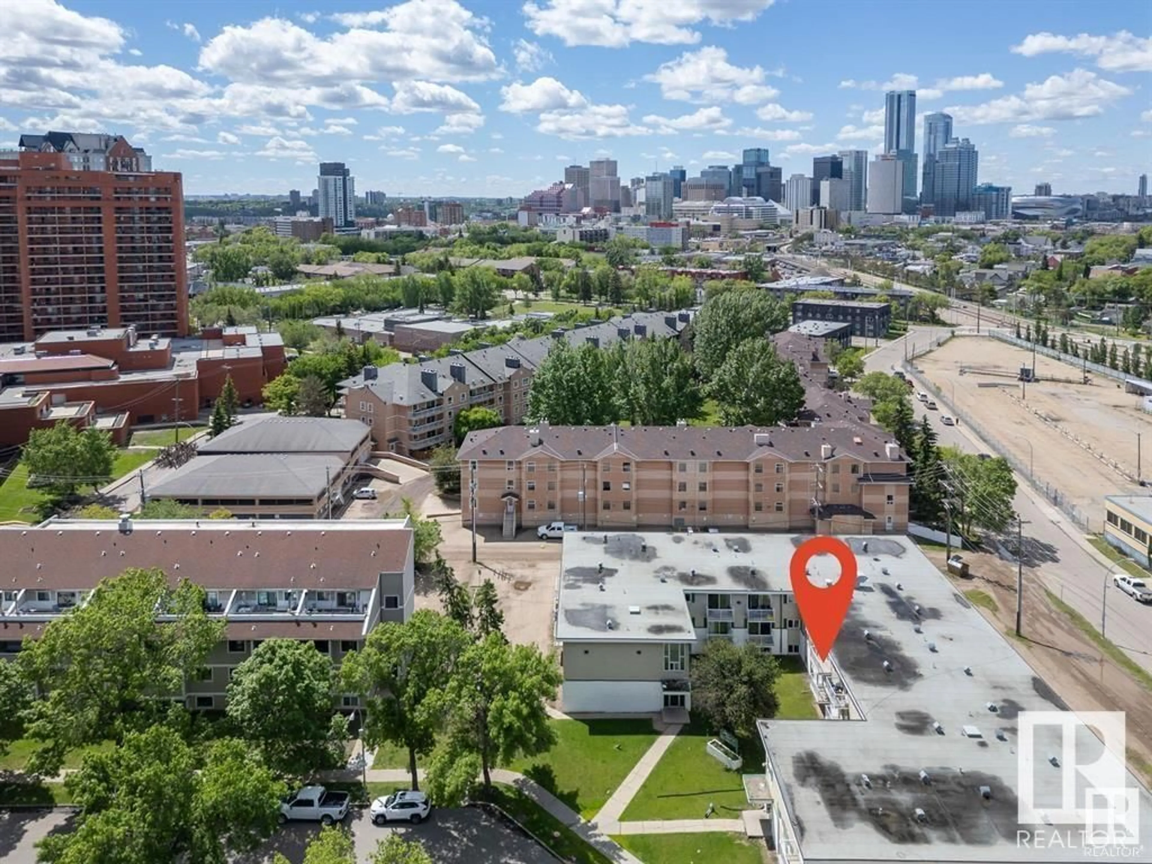 A pic from outside/outdoor area/front of a property/back of a property/a pic from drone, city buildings view from balcony for #203 8640 106 AV NW NW, Edmonton Alberta T5H0M7