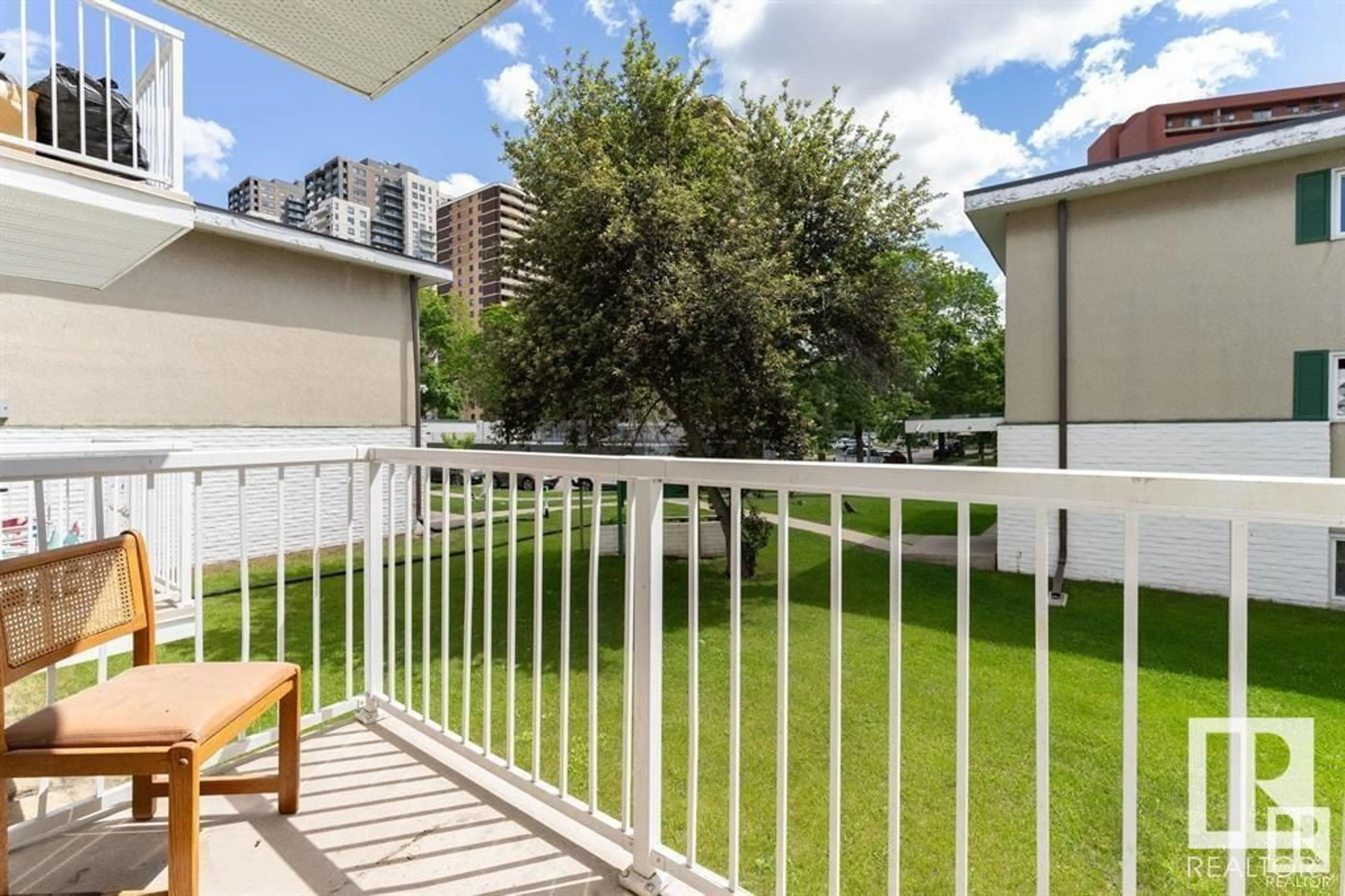 Balcony in the apartment, city buildings view from balcony for #203 8640 106 AV NW NW, Edmonton Alberta T5H0M7