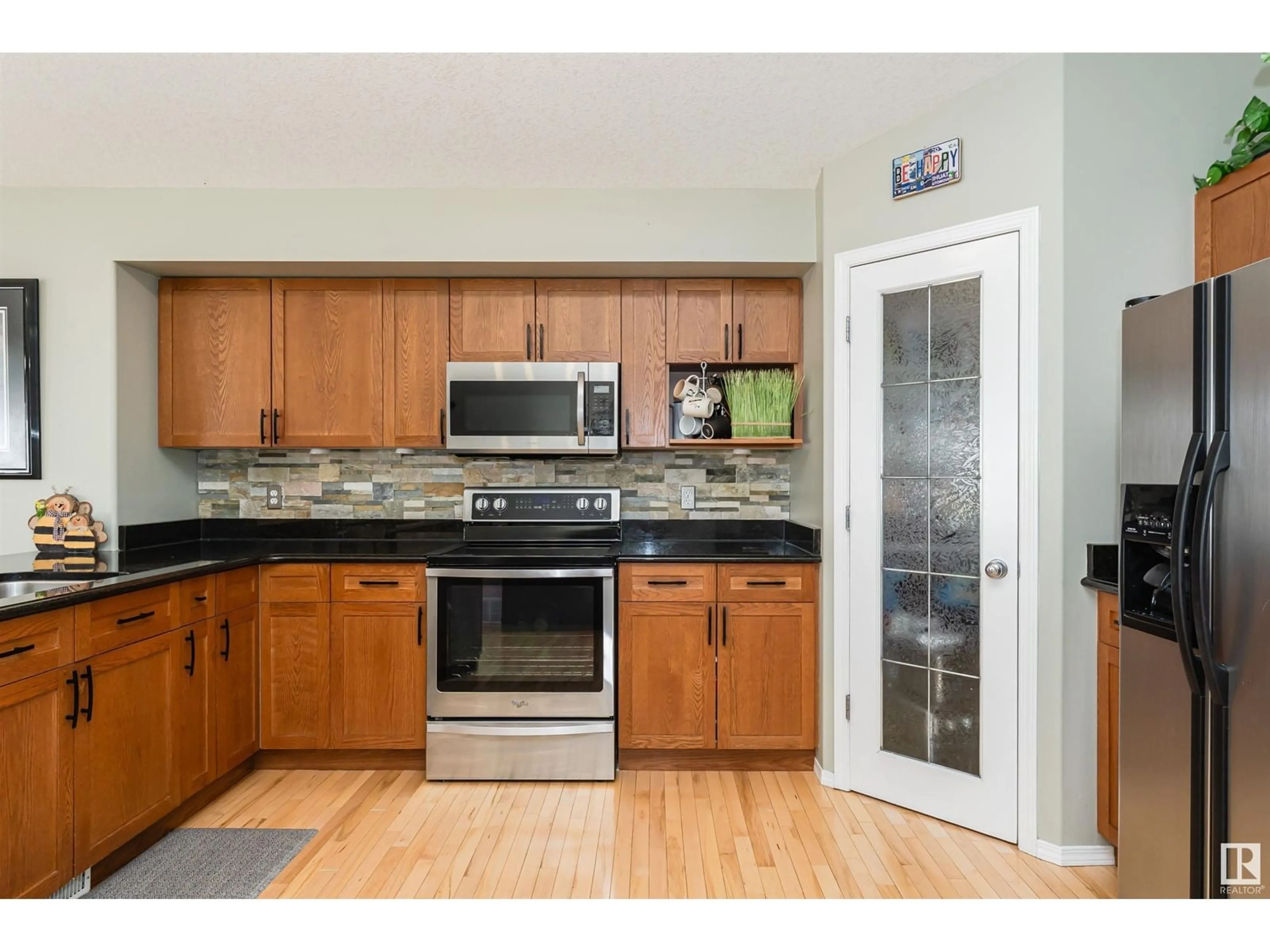 Standard kitchen, wood/laminate floor for 9 ERICKSON CL, St. Albert Alberta T8N7G5