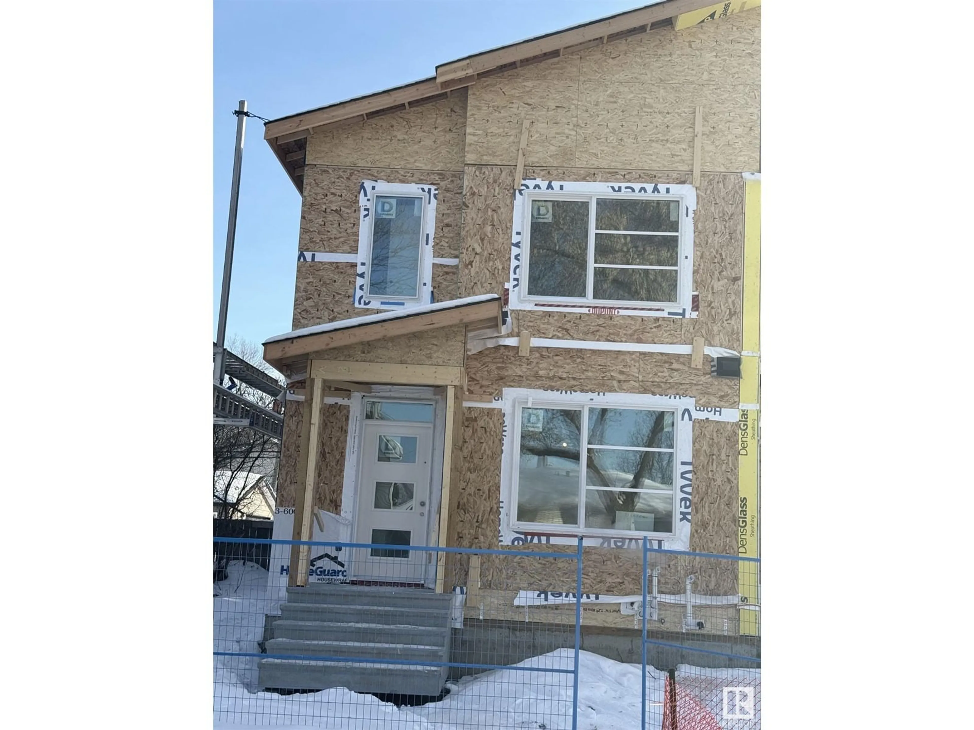 Home with brick exterior material, building for 11927 123 ST NW NW, Edmonton Alberta T5L0G9