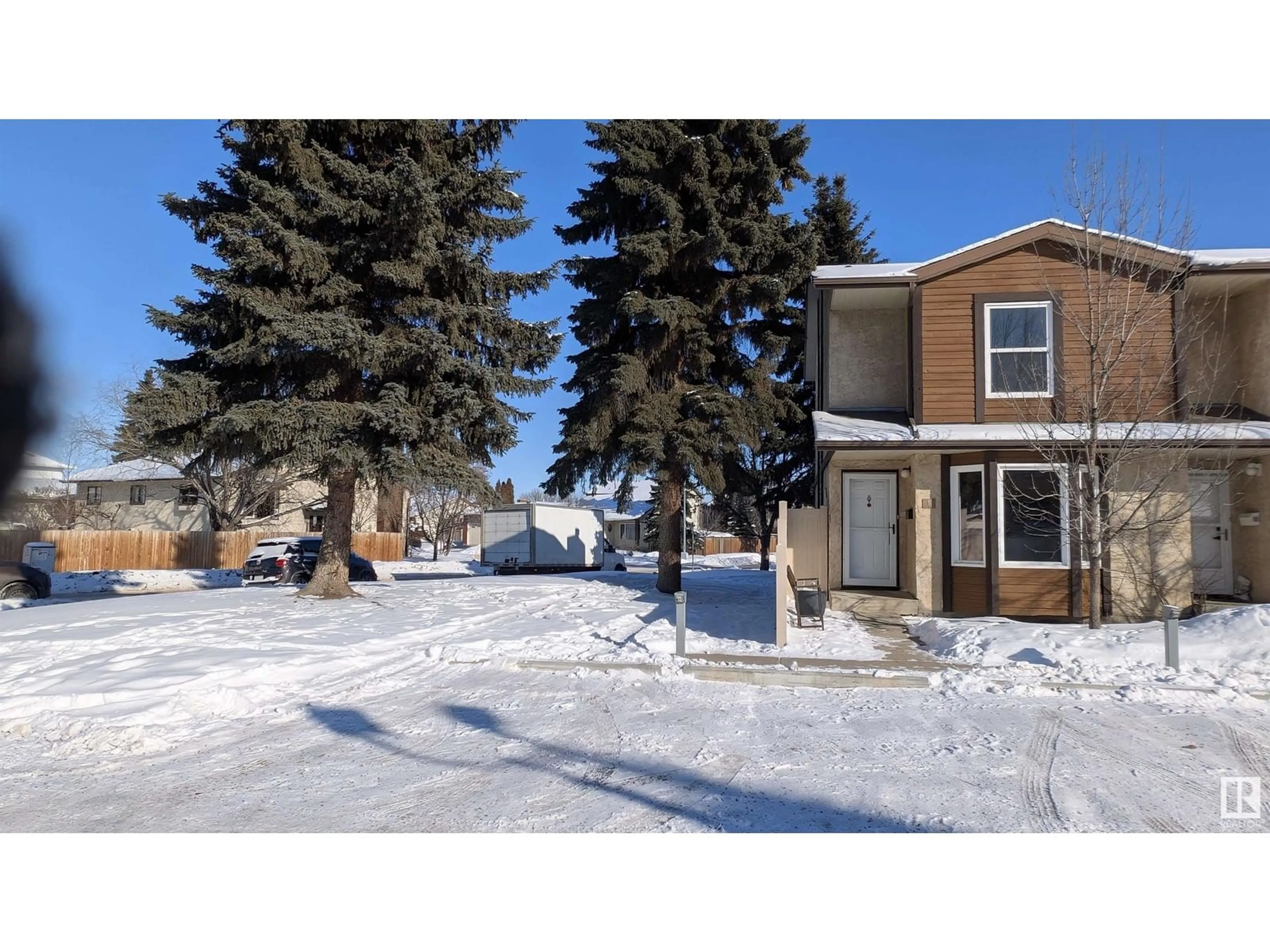 A pic from outside/outdoor area/front of a property/back of a property/a pic from drone, street for #1 10205 158 AV NW, Edmonton Alberta T5X5E5