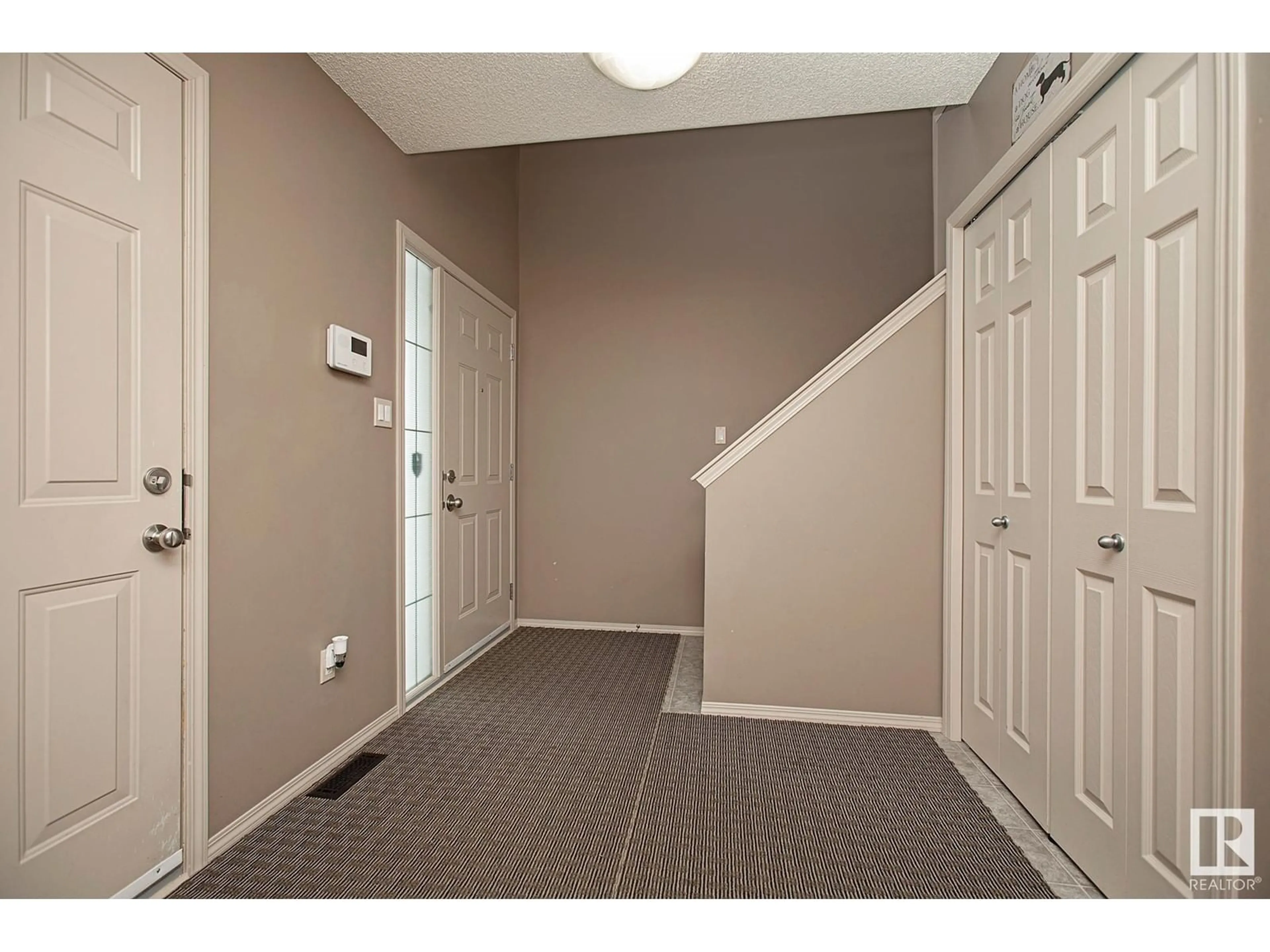 Indoor entryway for 3351 24 AV NW, Edmonton Alberta T6T1Y5