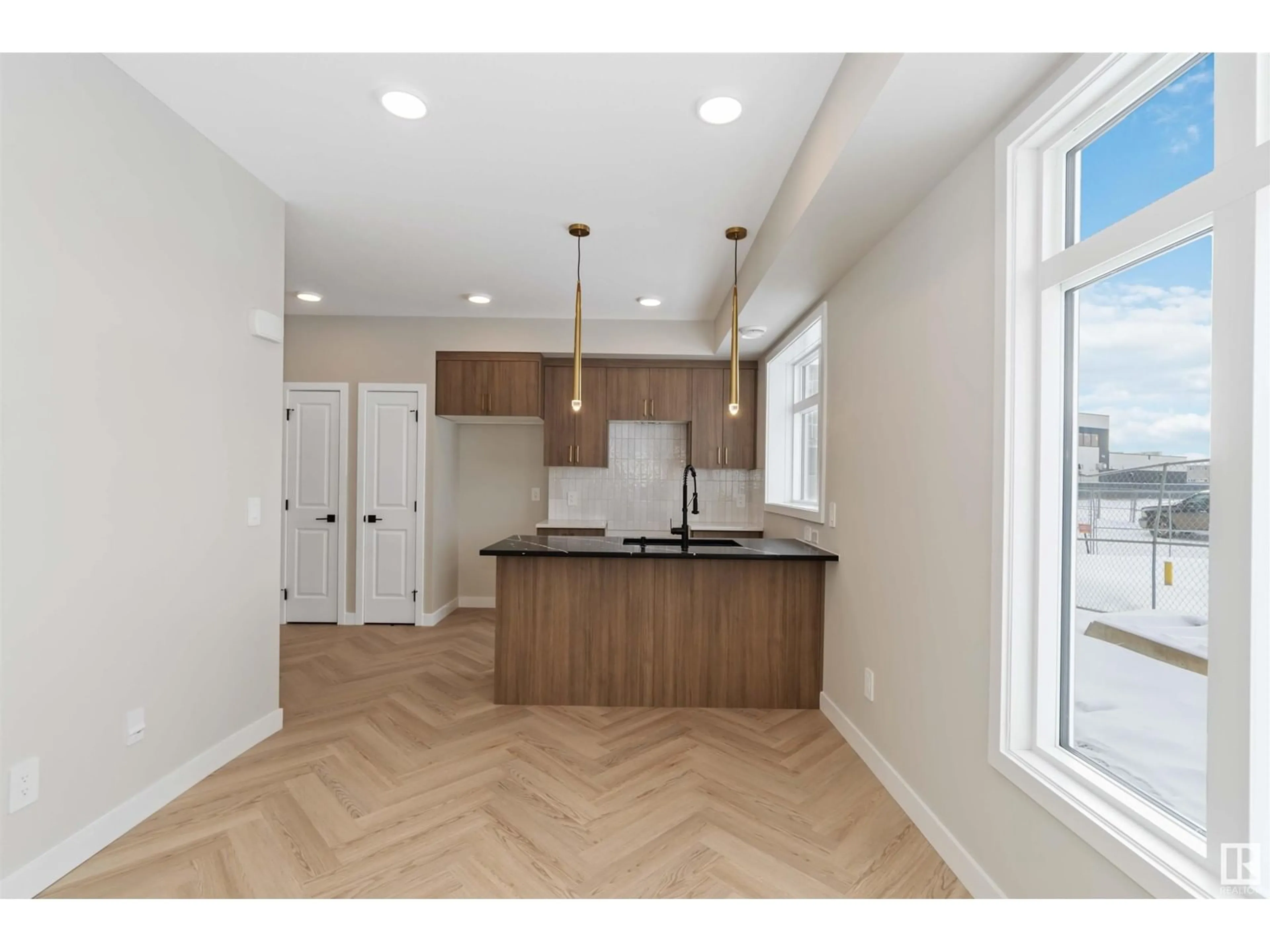 Open concept kitchen, unknown for #46 16231 19 AV SW, Edmonton Alberta T6W5C6