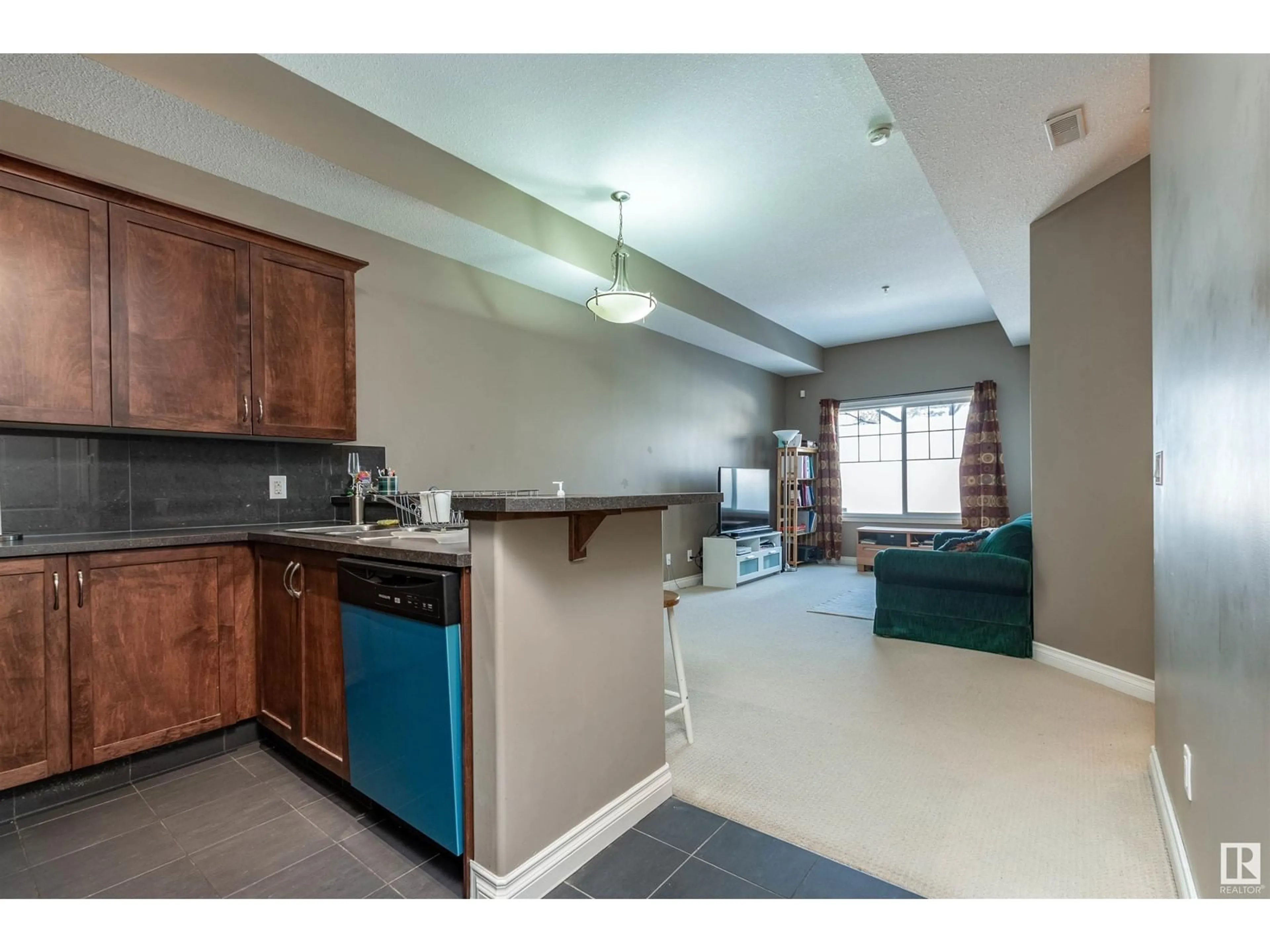 Open concept kitchen, unknown for #103 6720 112 ST NW, Edmonton Alberta T6H3J8